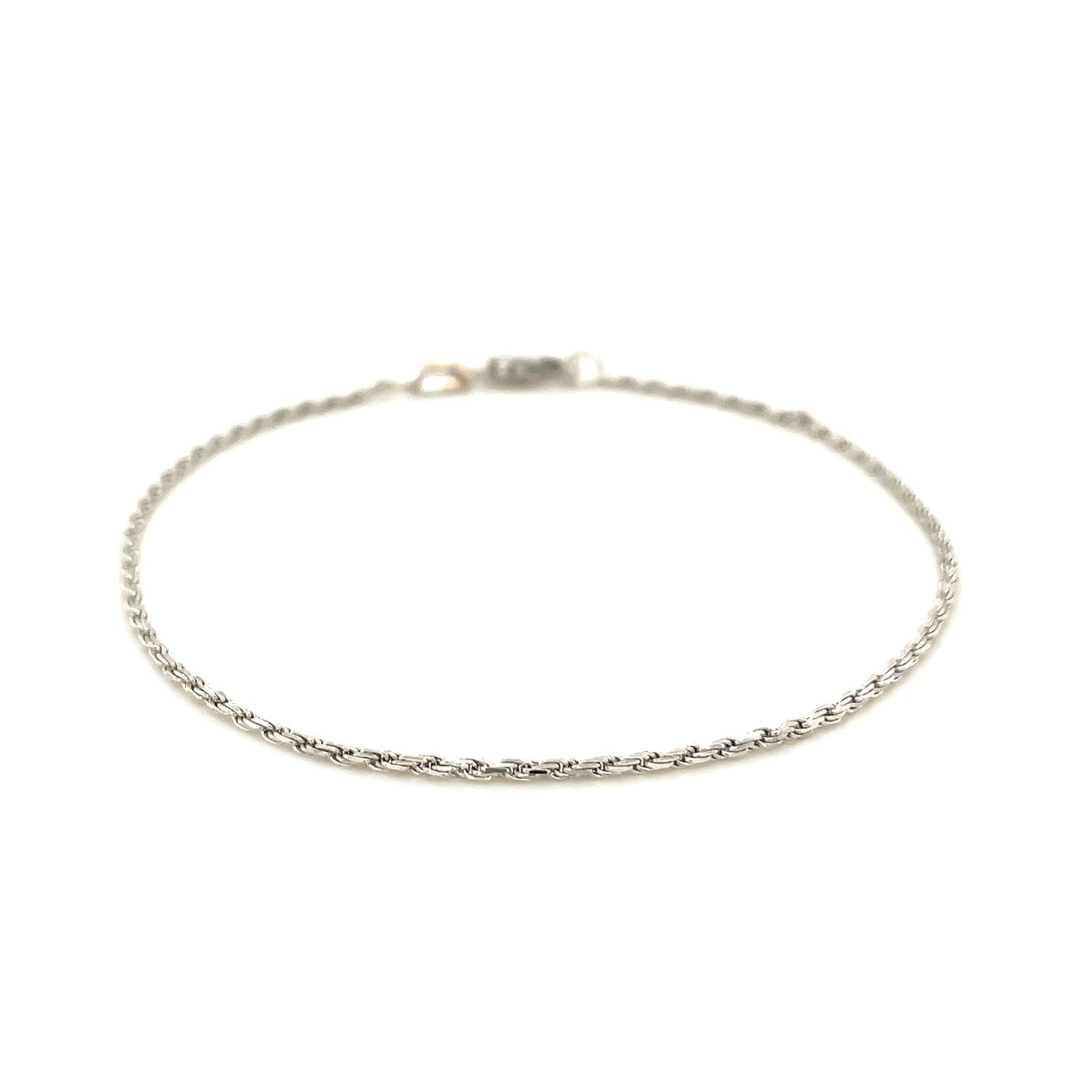 Elegant 14k white gold diamond cut rope bracelet showcasing intricate chain design and luxurious shine.