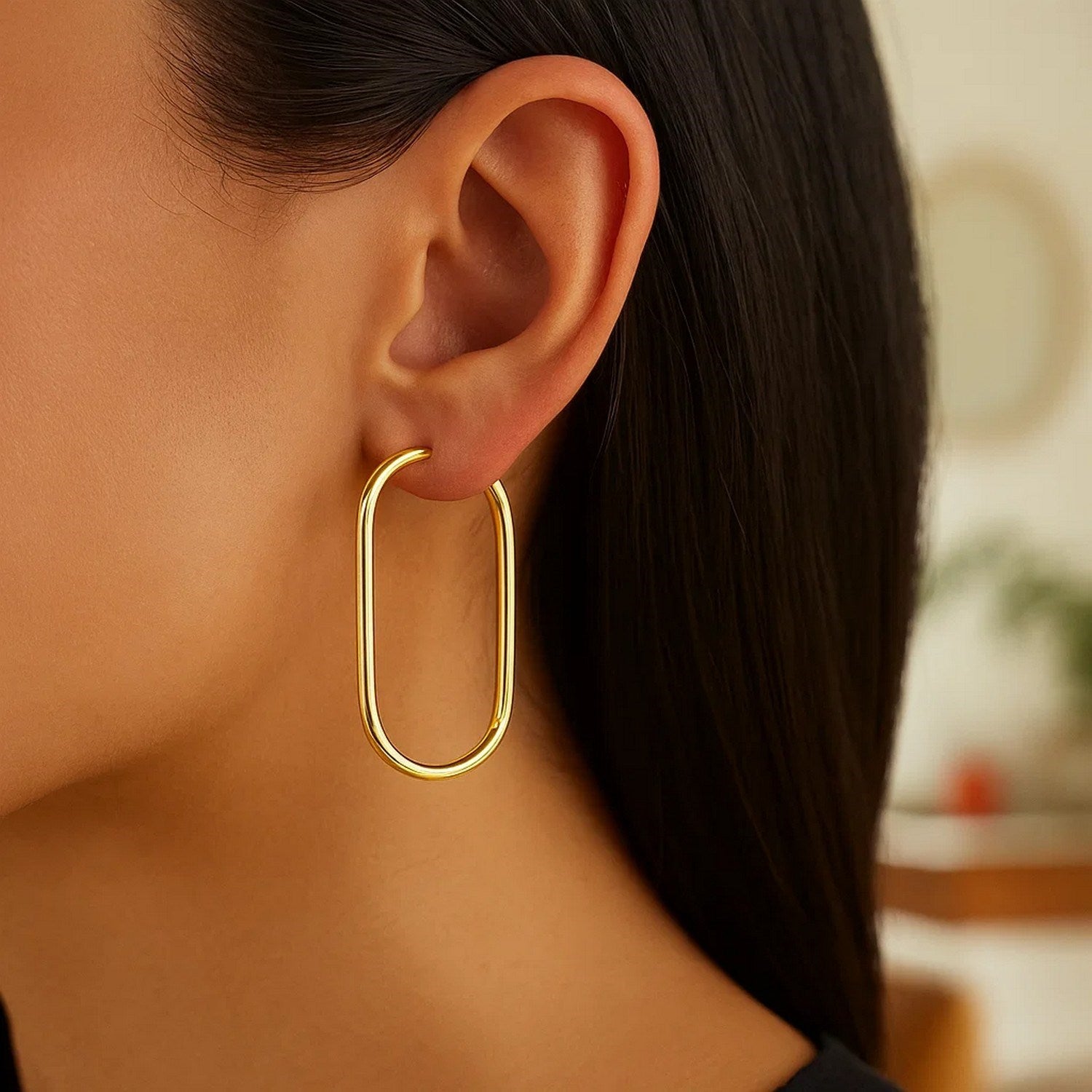 14k yellow gold large endless paperclip hoop earrings with a modern design, perfect for elegant everyday wear.