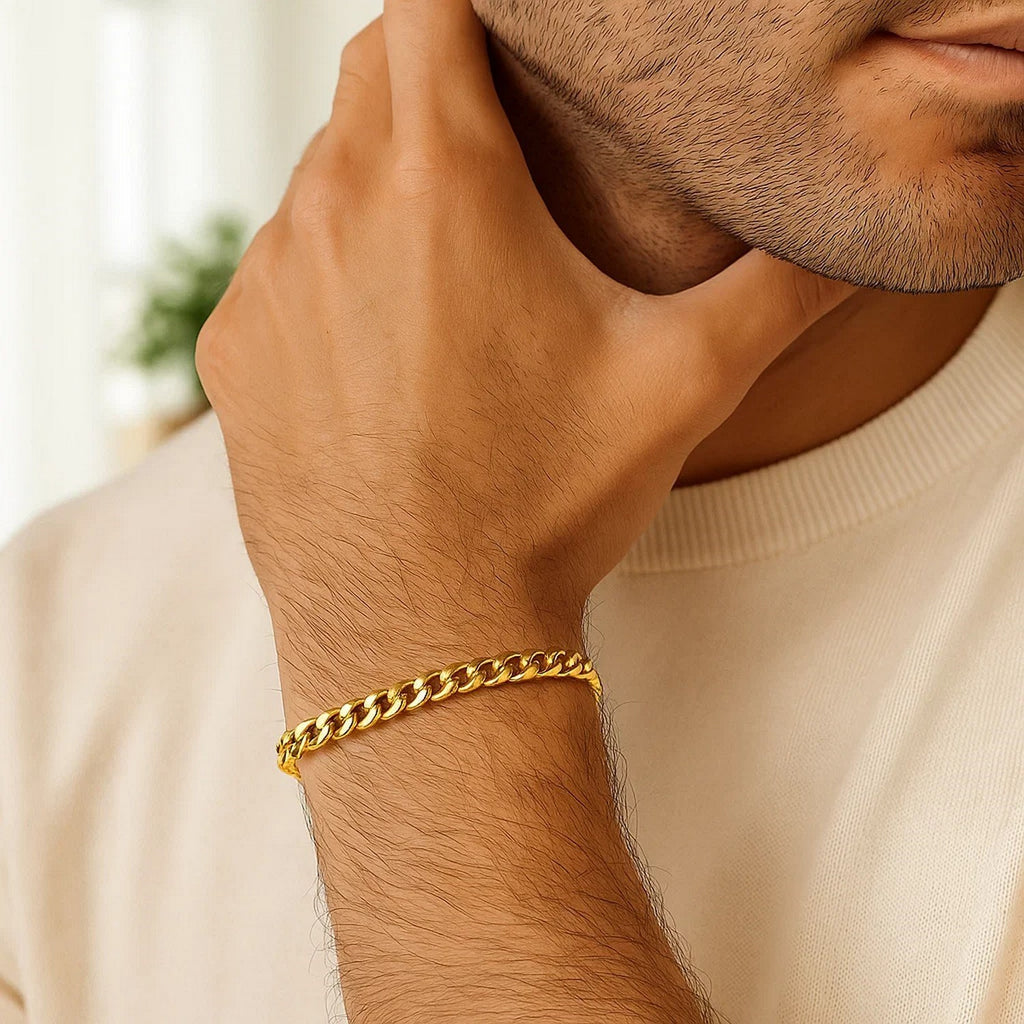 14k yellow gold Miami Cuban semi-solid bracelet, 5.50 mm, showcasing a classic luxury design with elegant shine.