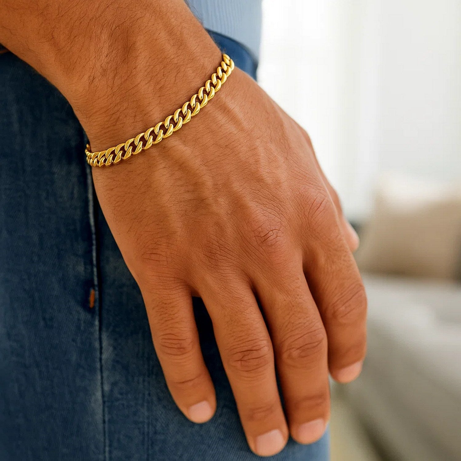 14k yellow gold Miami Cuban bracelet, semi-solid design, 5.50 mm width, exuding classic luxury and elegance.