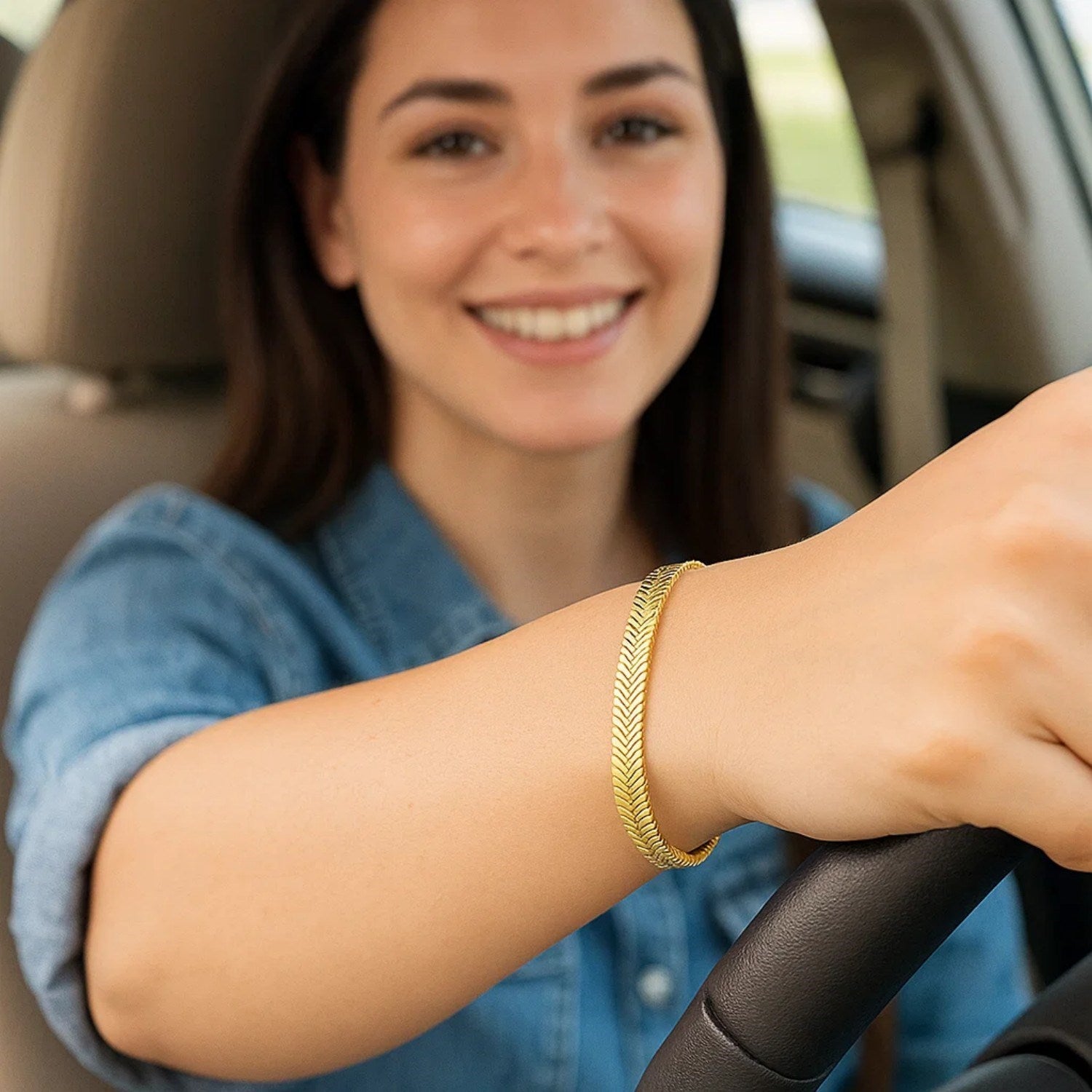 14k yellow gold oval snake chain bracelet with a modern design, showcasing a sleek and elegant silhouette.