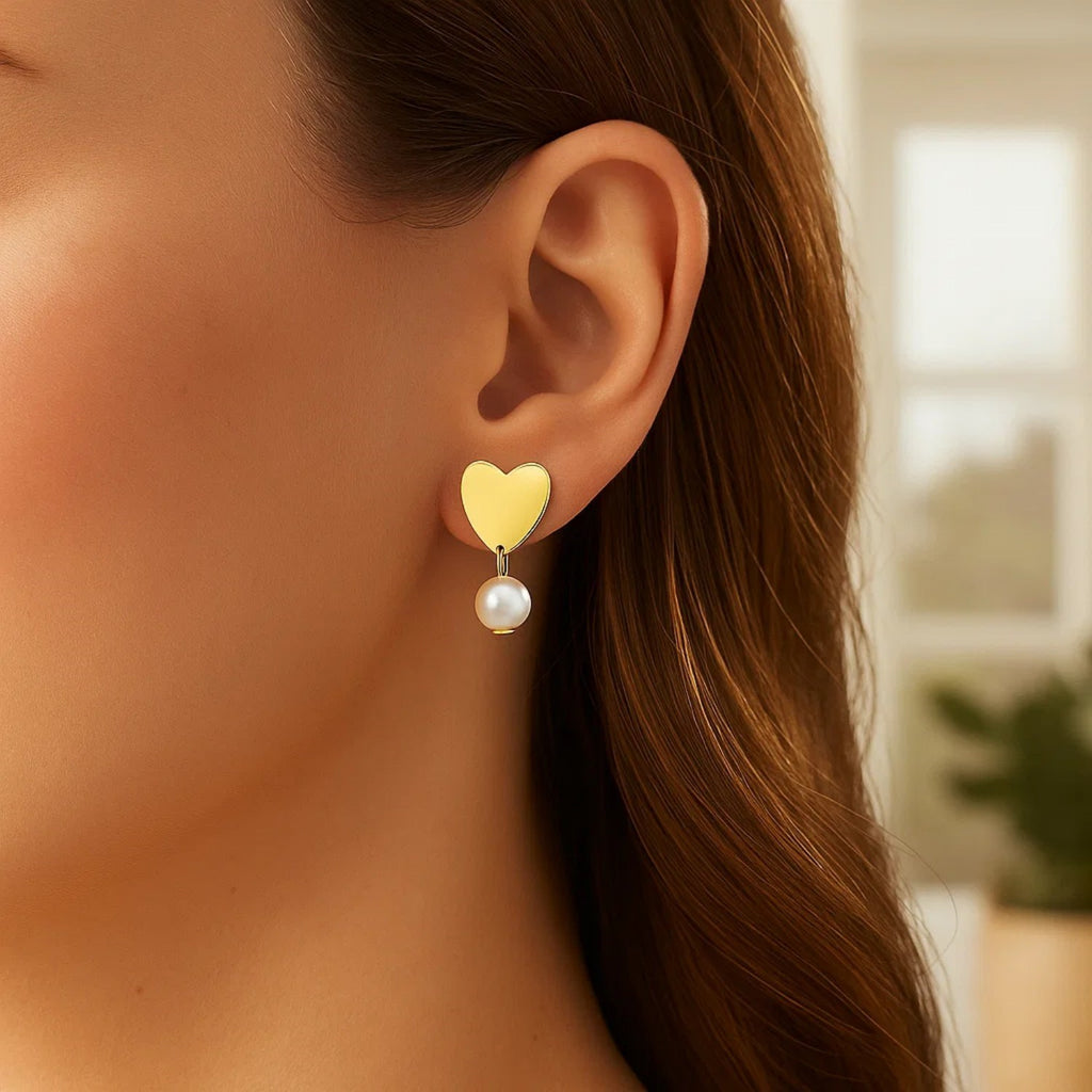 Elegant 14K yellow gold pearl drop stud earrings featuring a classic round design for timeless luxury.