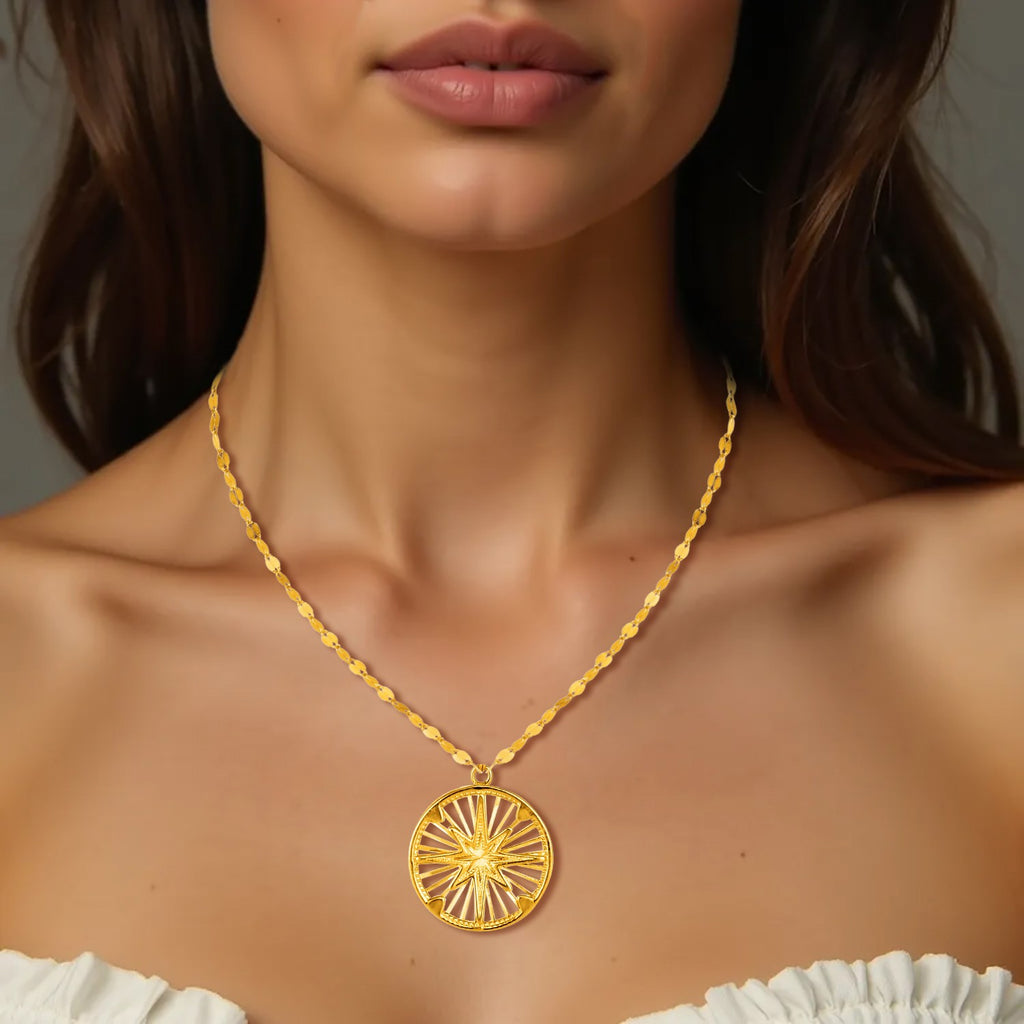 14k yellow gold necklace featuring a modern compass pendant on a delicate link chain.