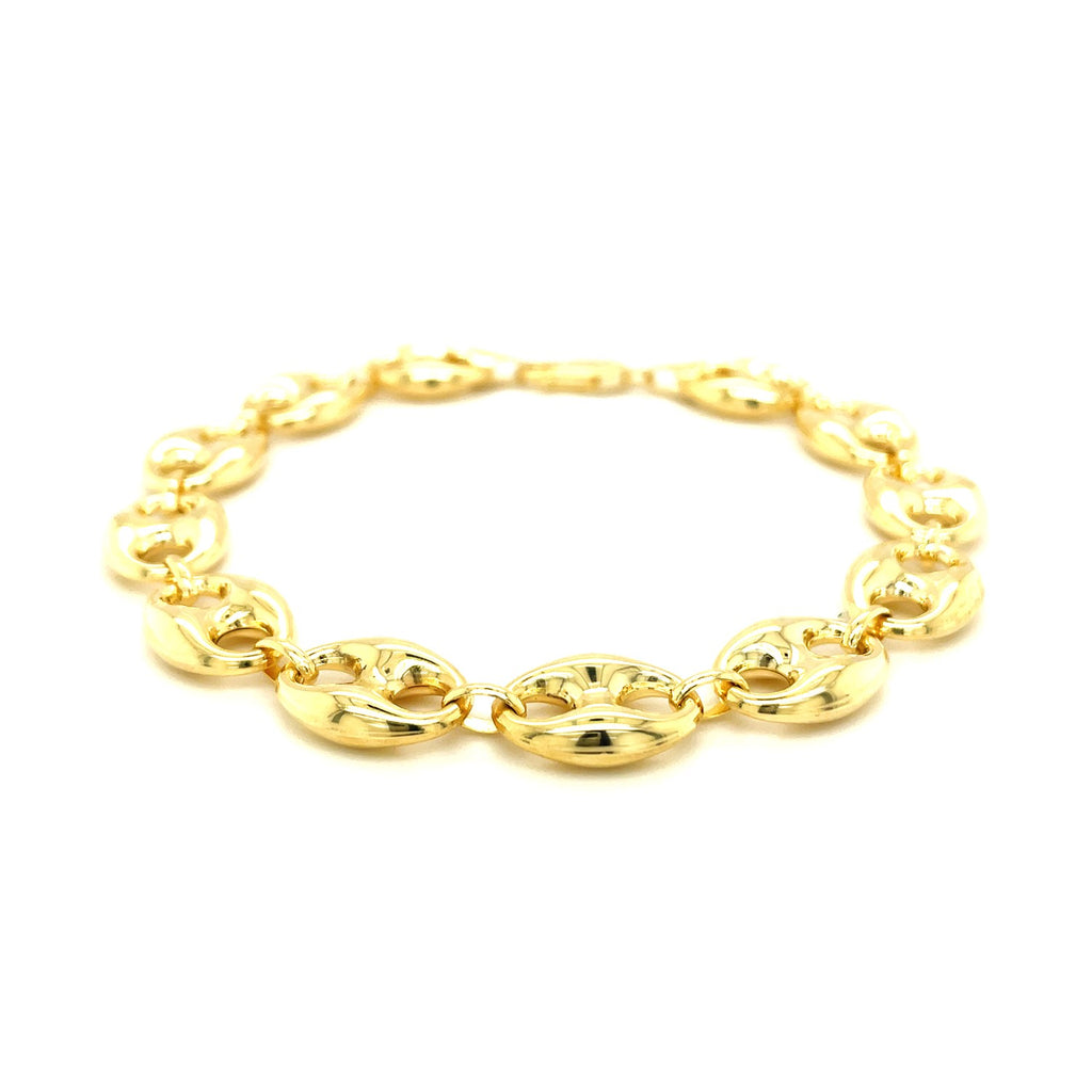 14k yellow gold puffed mariner link bracelet, elegantly designed with bold, smooth links for a luxurious finish.