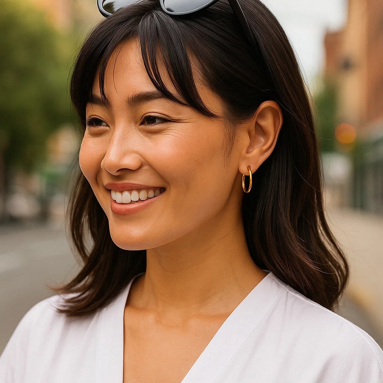 14k yellow gold minimalist endless round hoop earrings showcasing elegant simplicity and timeless design.