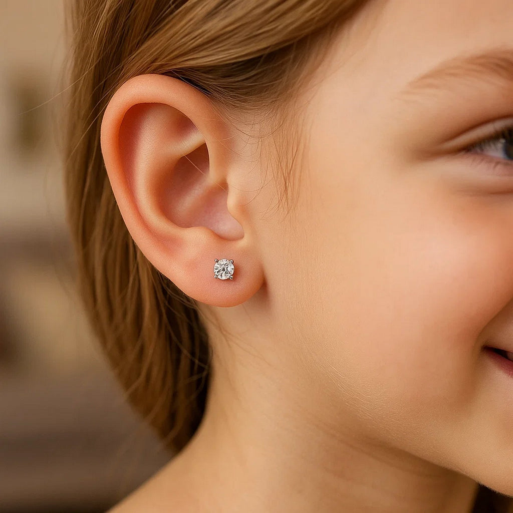 14k white gold modern stud earrings featuring faceted round white cubic zirconia in elegant prong settings.