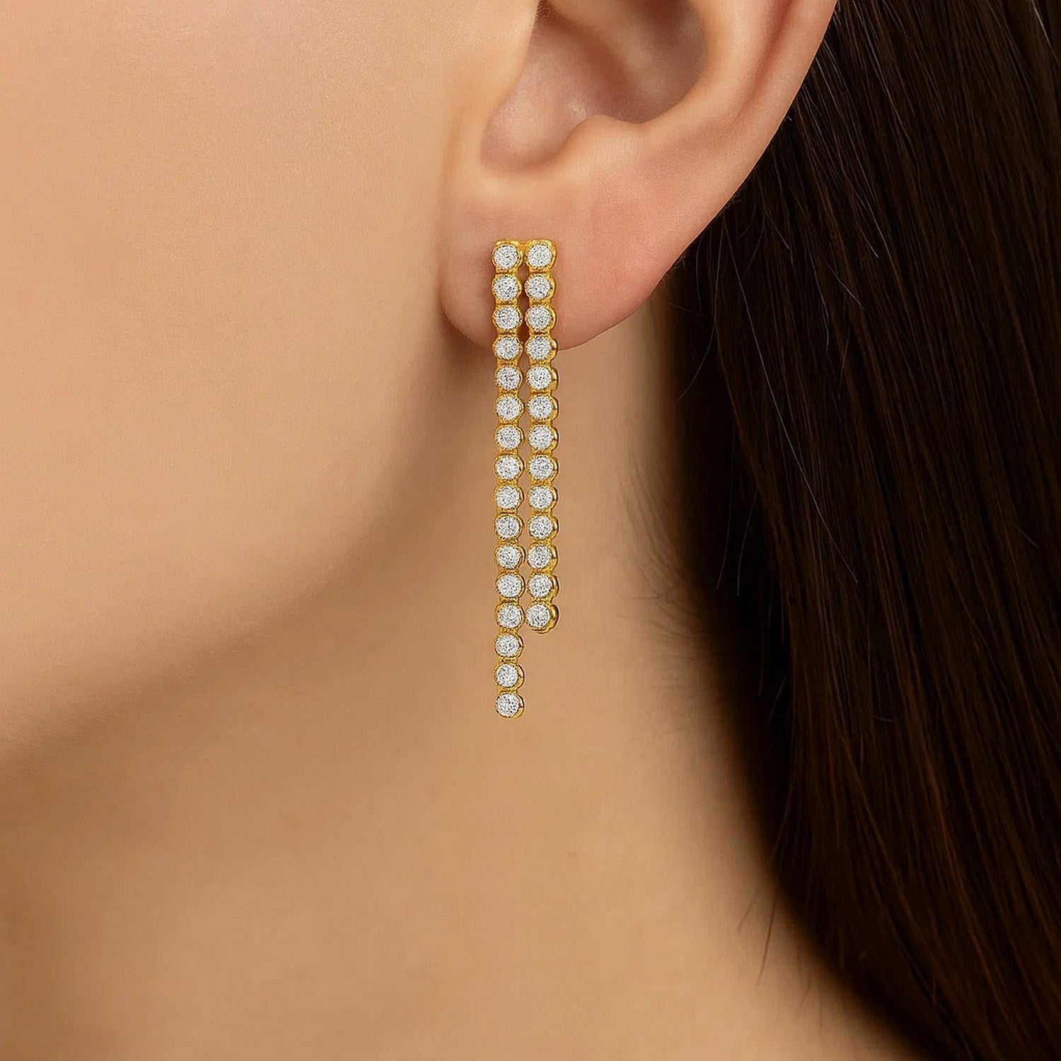 14K two-tone gold diamond polished cascade drop earrings showcasing minimalist elegance and refined craftsmanship.