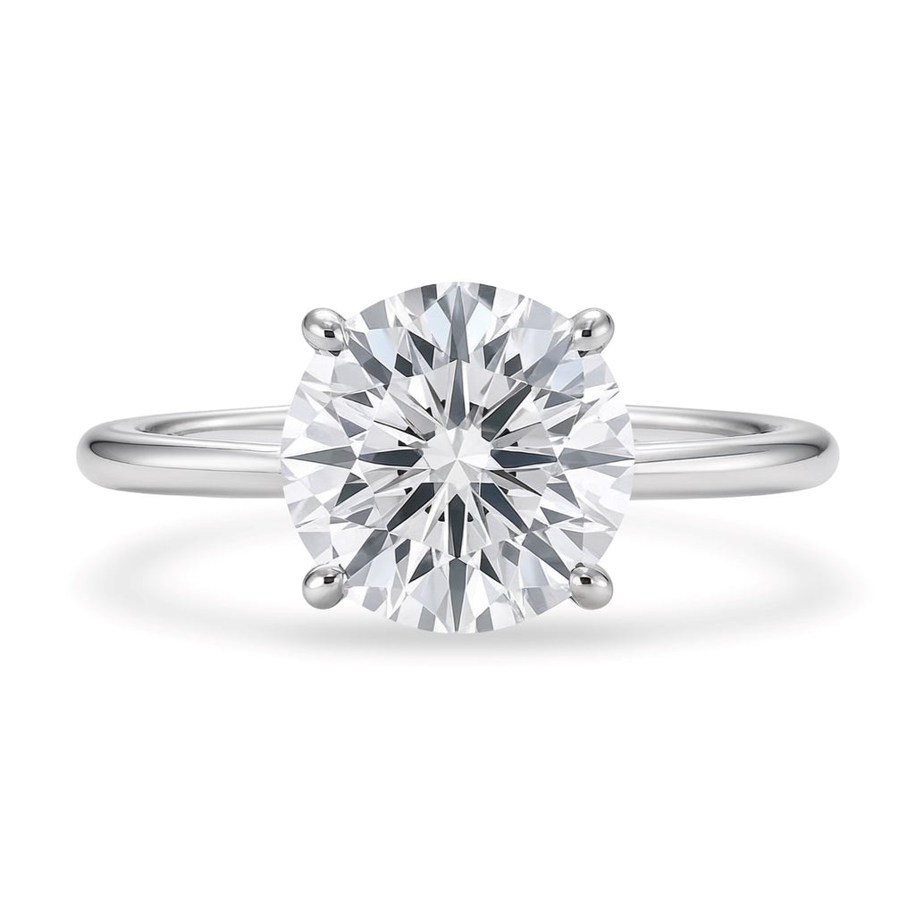 3 carat round lab-grown diamond solitaire ring in elegant 10K white gold with a classic prong setting.