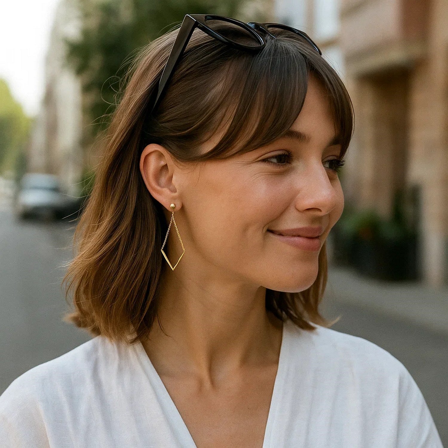 14k yellow gold chain drop earrings featuring elegant diamond shapes for a minimalist, luxurious look.