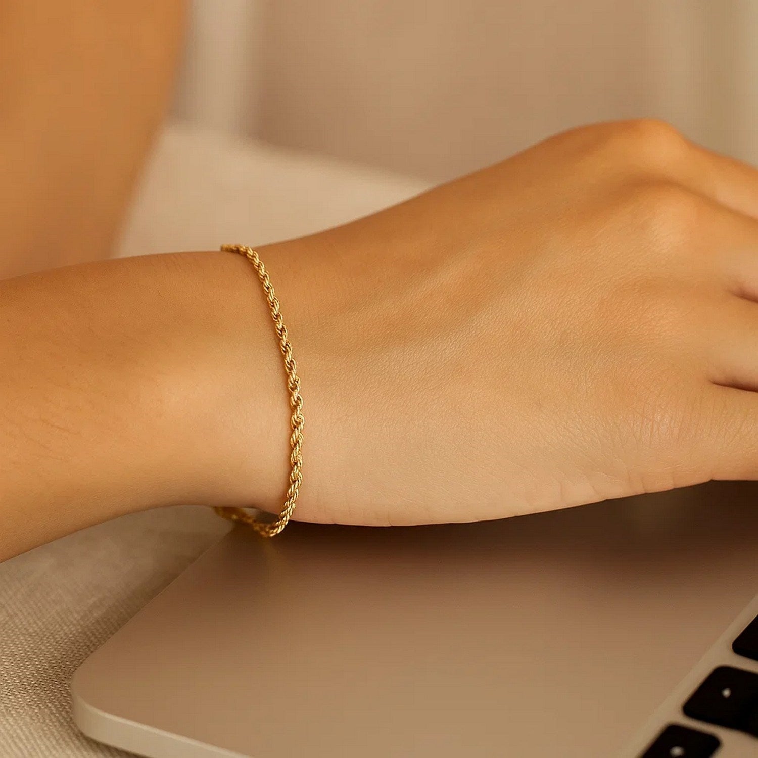 10k yellow gold diamond cut rope bracelet, modern luxury design, featuring intricate diamond detailing and elegant texture.