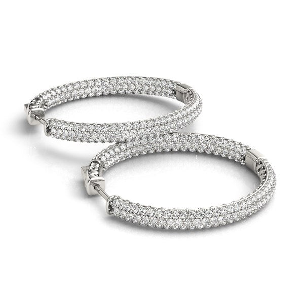 14k white gold pave set diamond hoop earrings featuring a modern design and exquisite round diamonds (7 cttw).