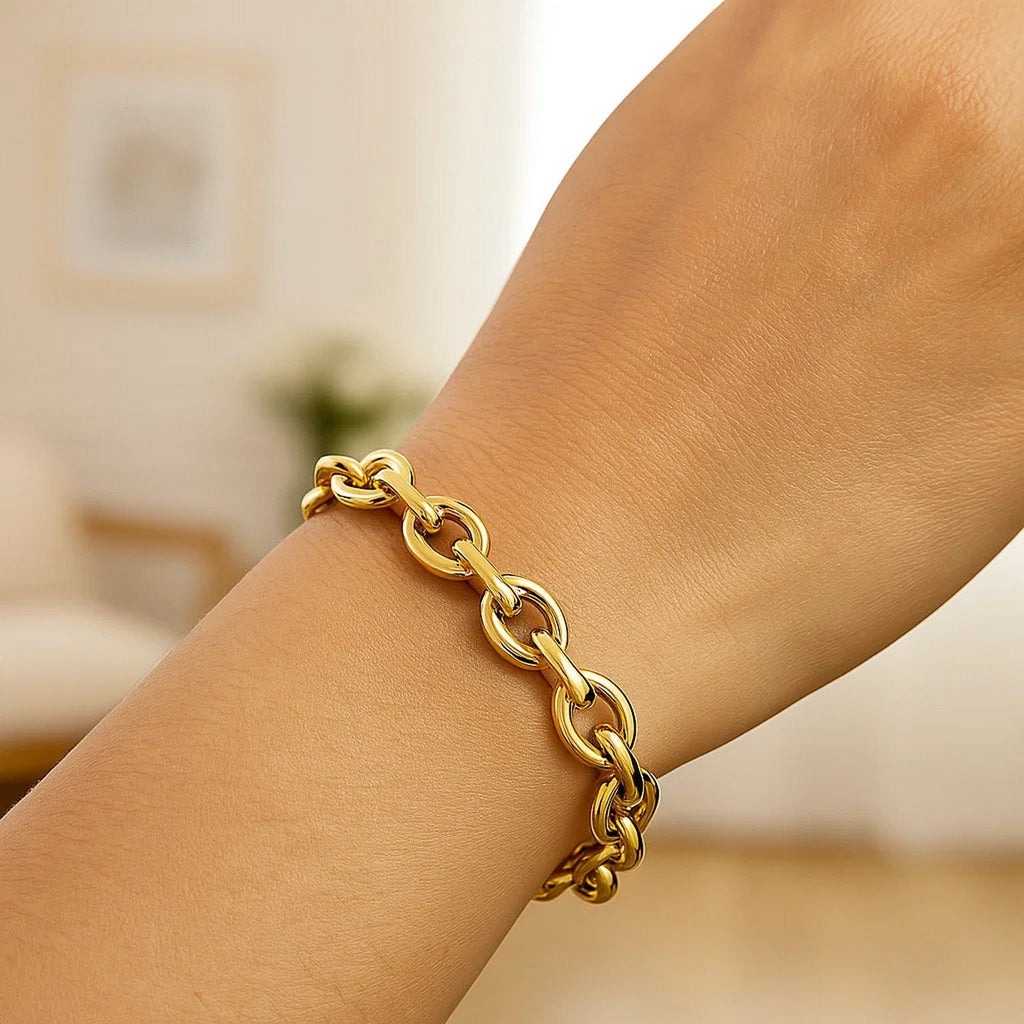 14k yellow gold polished cable link bracelet showcasing modern elegance and refined craftsmanship.