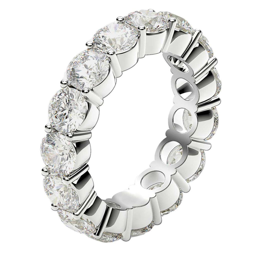 Round cut lab-grown diamond eternity ring in 14k white gold, featuring a modern prong setting and 5 cttw brilliance.