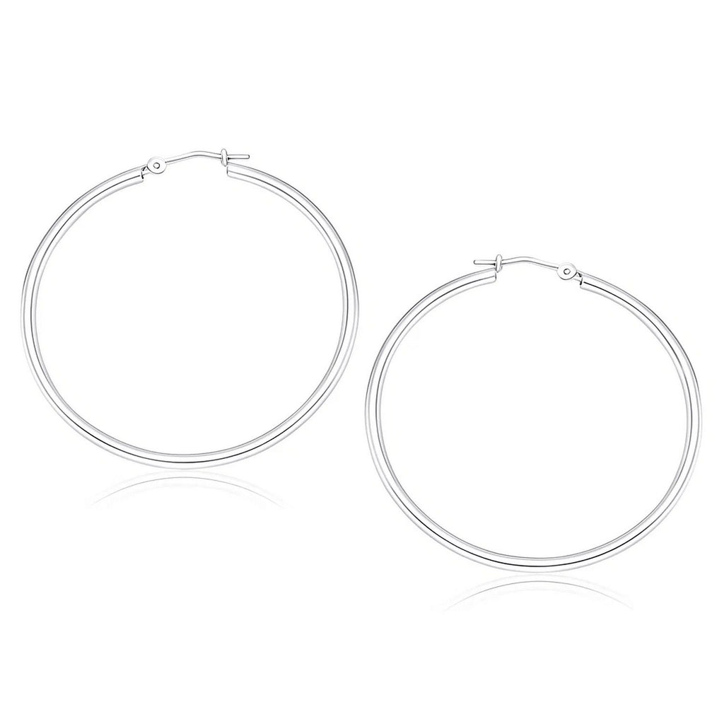 Elegant 10k white gold polished hoop earrings crafted from 14k gold, perfect for sophisticated occasions.