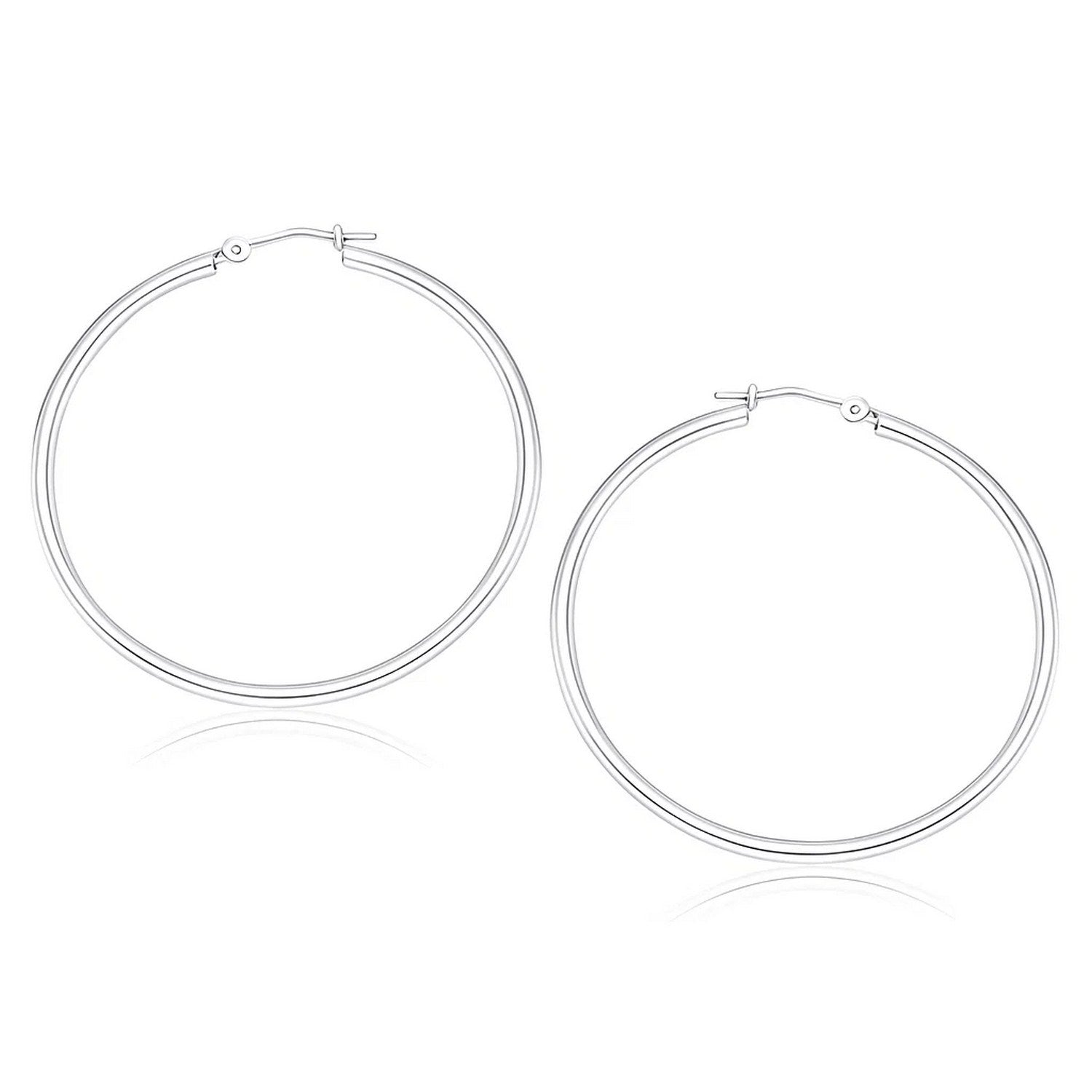 Elegant 10k white gold polished hoop earrings crafted from 14k gold, perfect for sophisticated occasions.