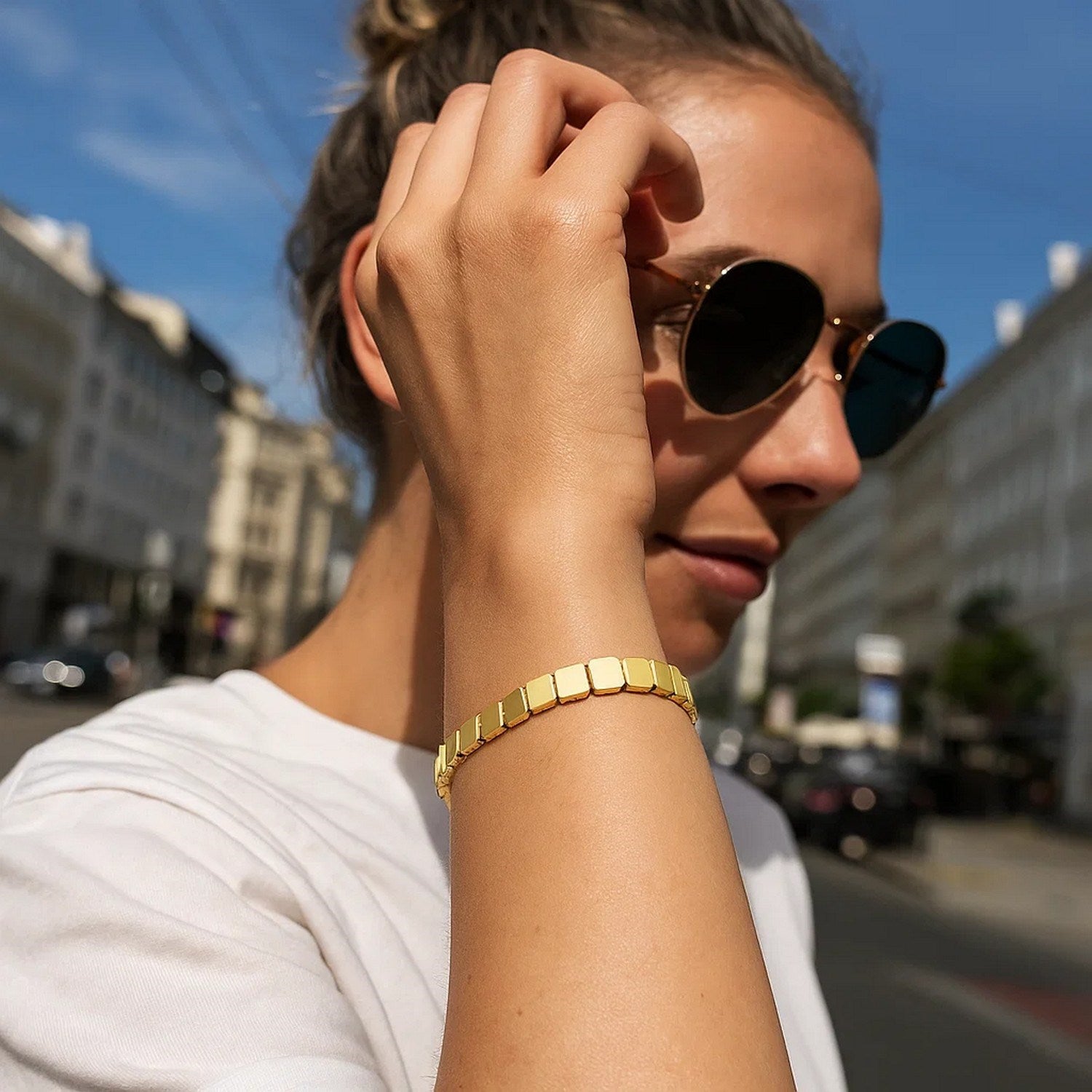 14k yellow gold high polish square link bracelet with modern design and elegant stud detailing, perfect for luxury styling.