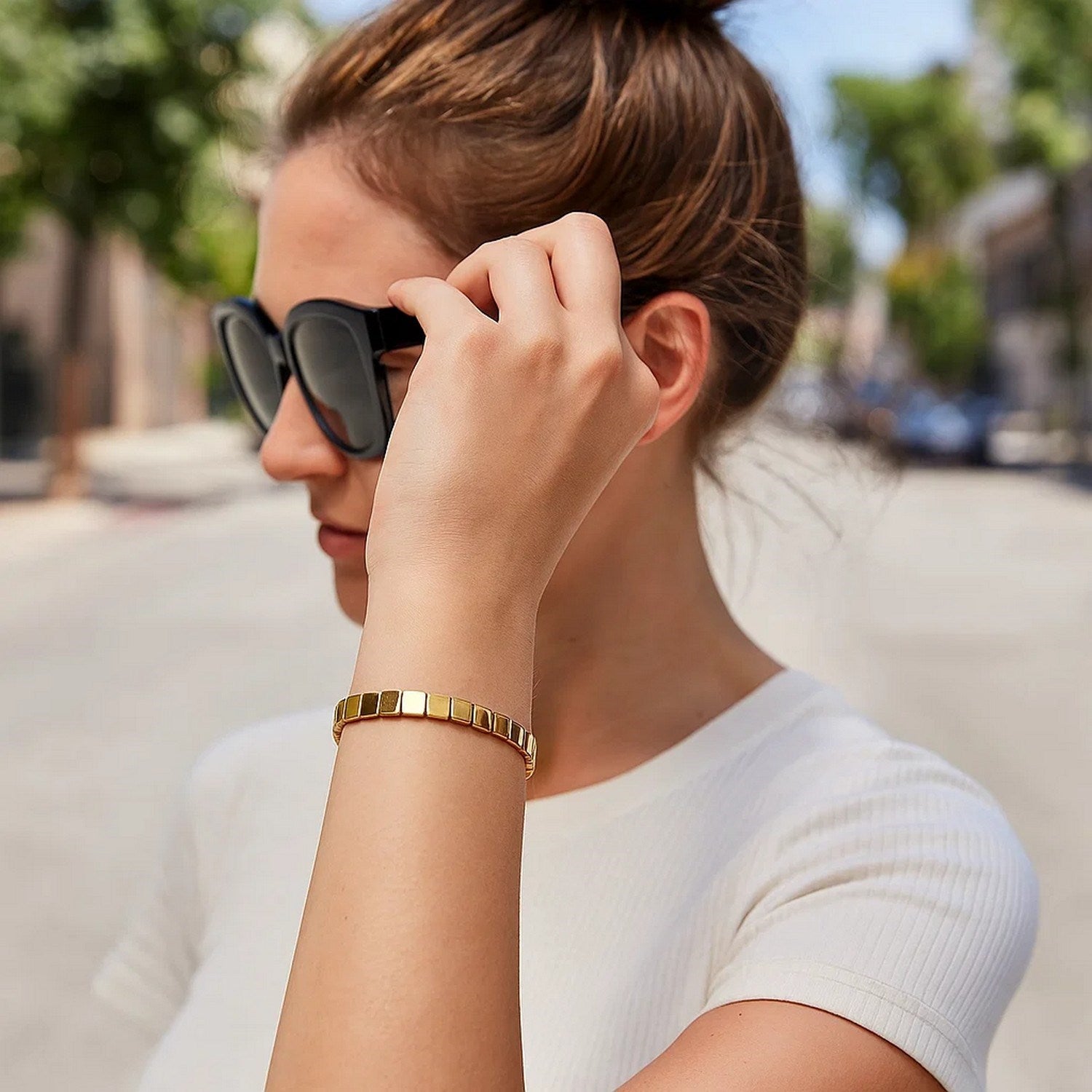 14k yellow gold high polish square link bracelet with modern design and luxurious shine, perfect for elegant styling.