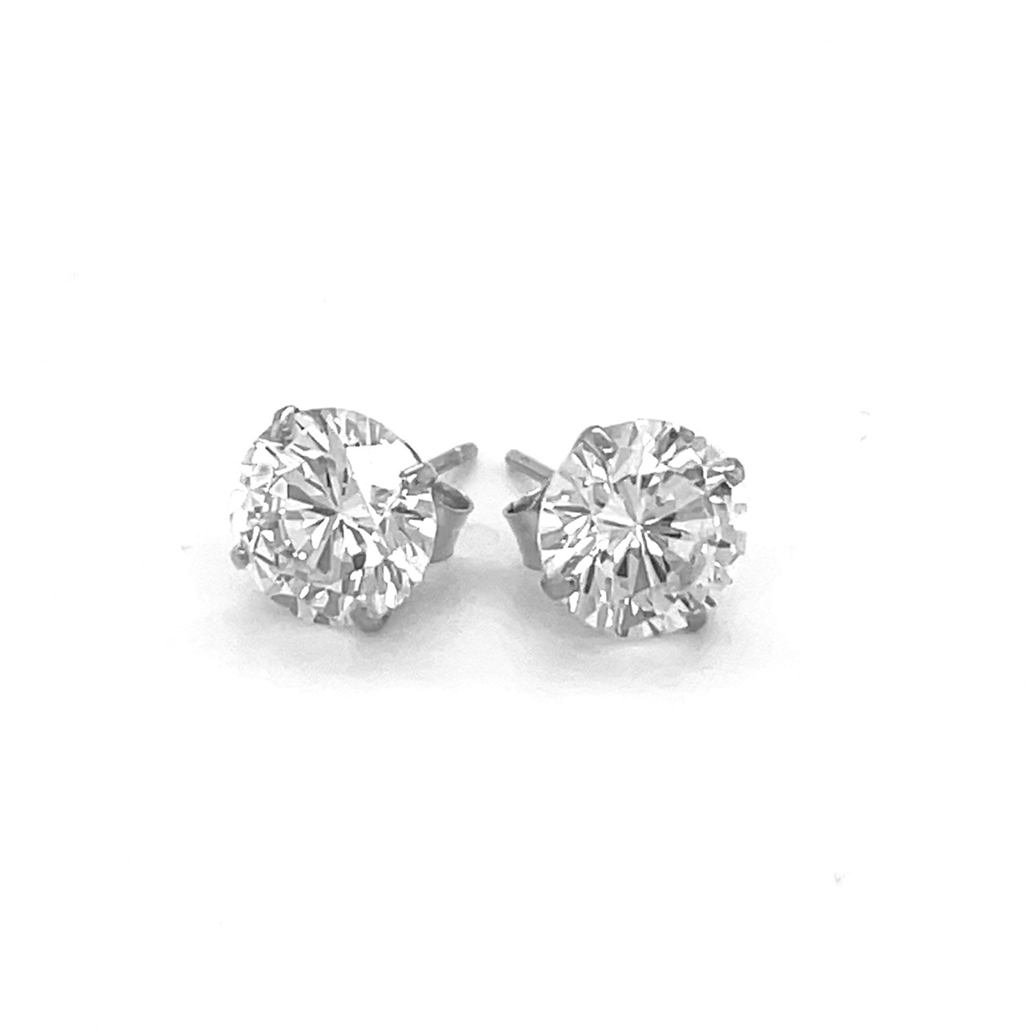 14k white gold modern stud earrings featuring faceted cubic zirconia in elegant prong settings.