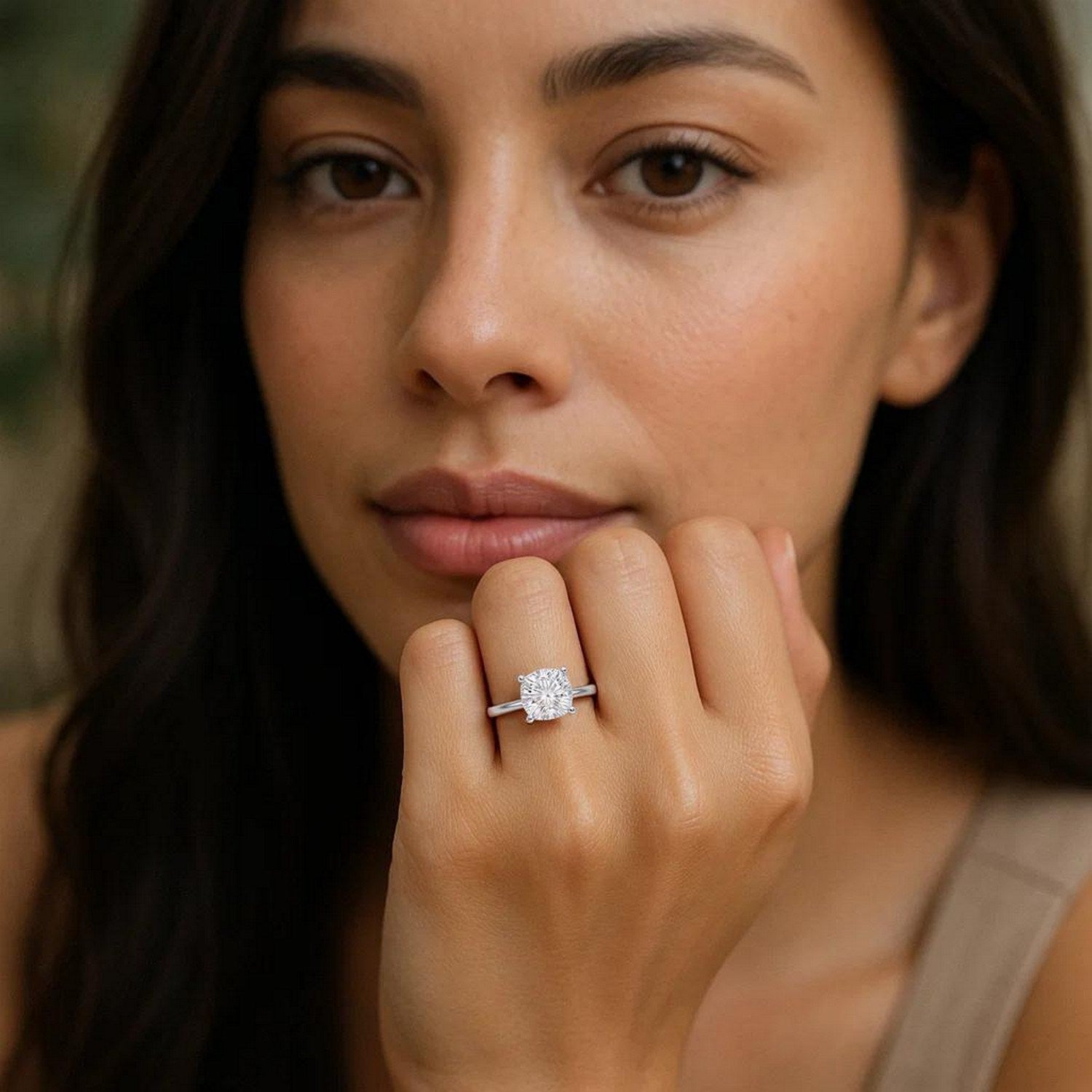 1 1/2 carat cushion diamond solitaire ring in 14k white gold, featuring a classic prong setting for timeless elegance.