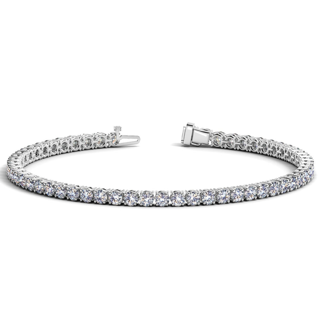 Lab grown diamond tennis bracelet in 14k white gold, featuring prong settings and 7 cctw of F/G VS2/SI1 diamonds.
