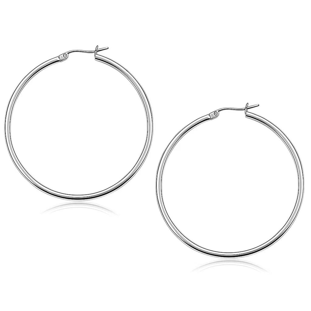 14k white gold polished hoop earrings with a sleek modern design, perfect for elegant everyday wear.