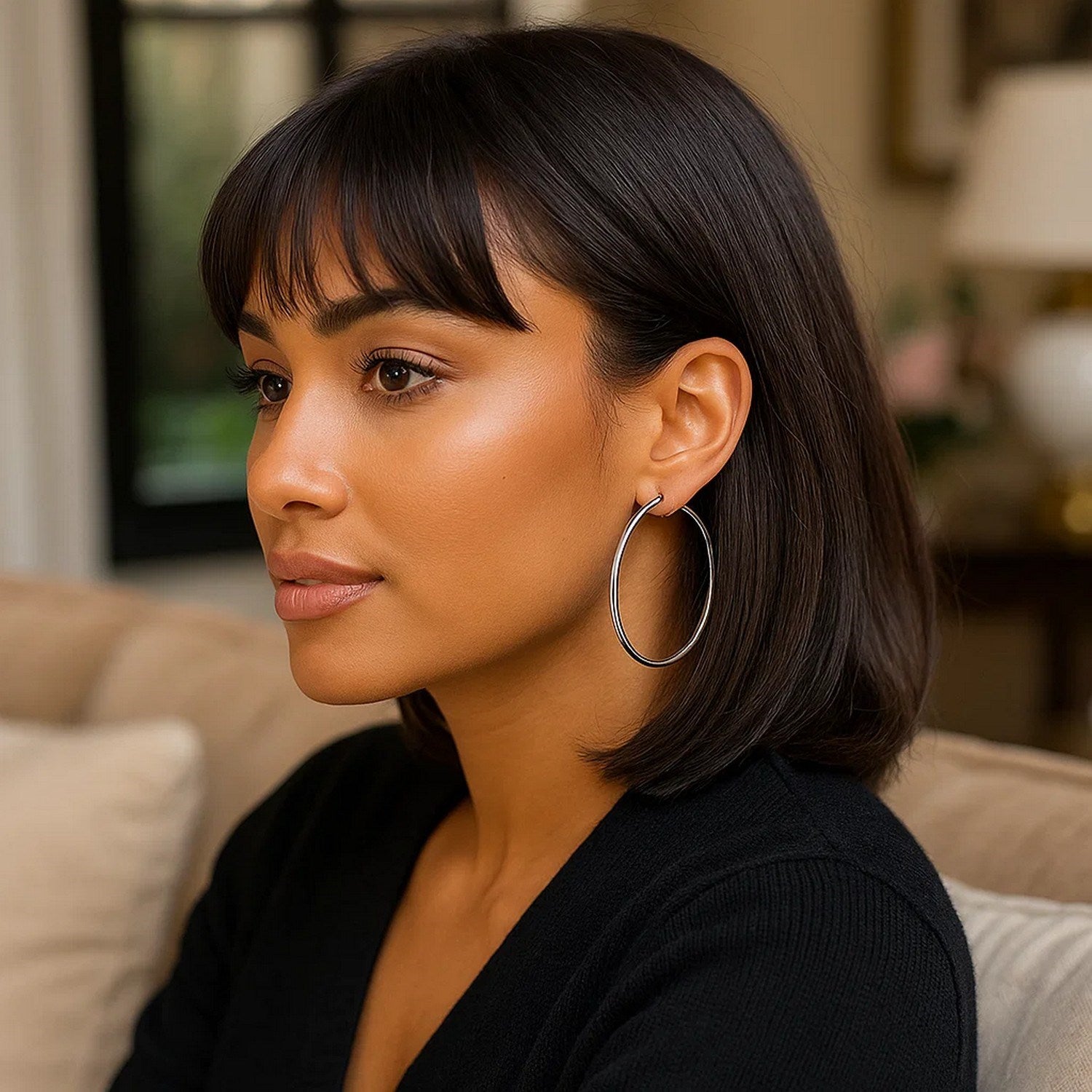 Polished 10k white gold hoop earrings featuring a modern design, perfect for elegant occasions and everyday wear.