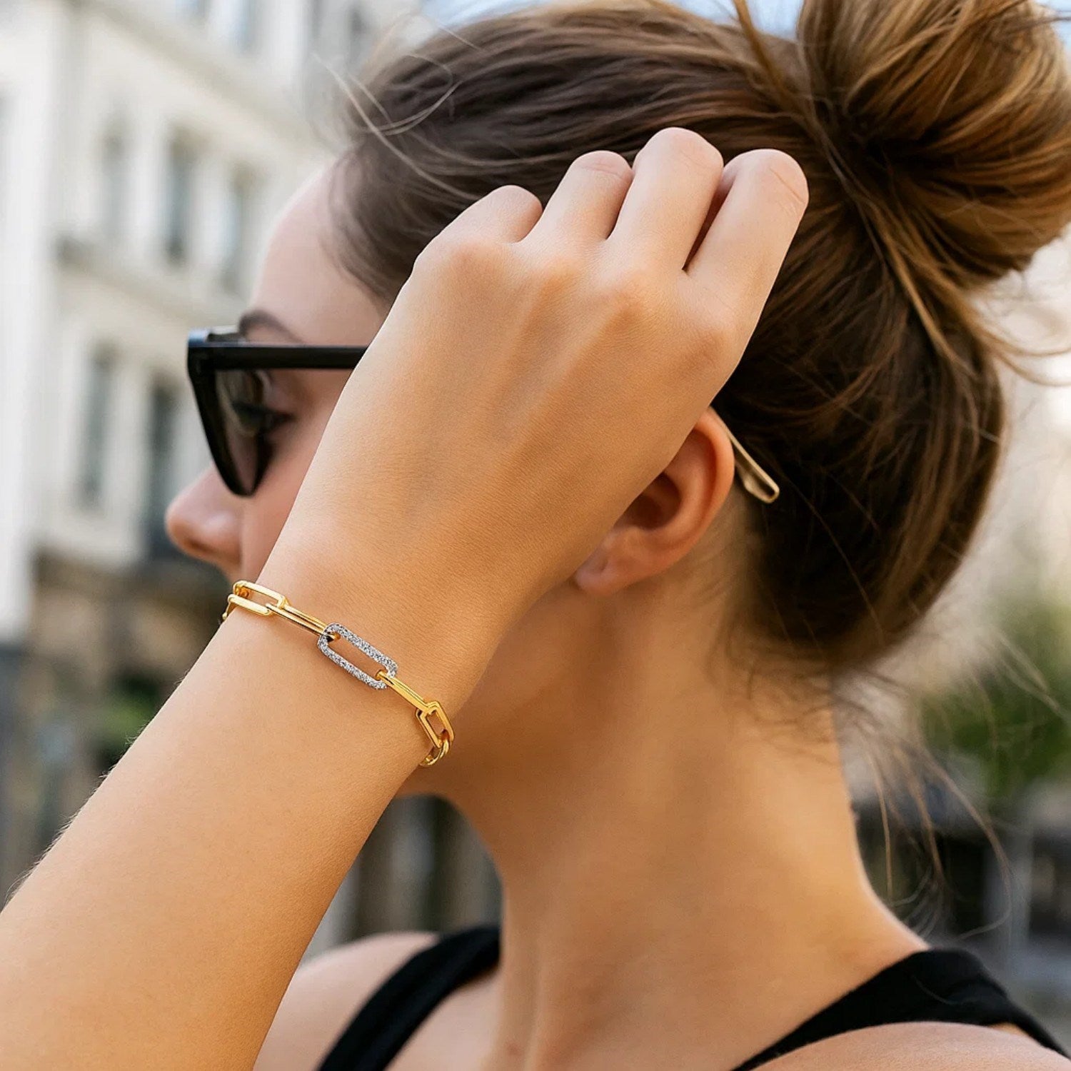 14k yellow gold paperclip chain bracelet featuring three exquisite diamond links for a modern, elegant touch.