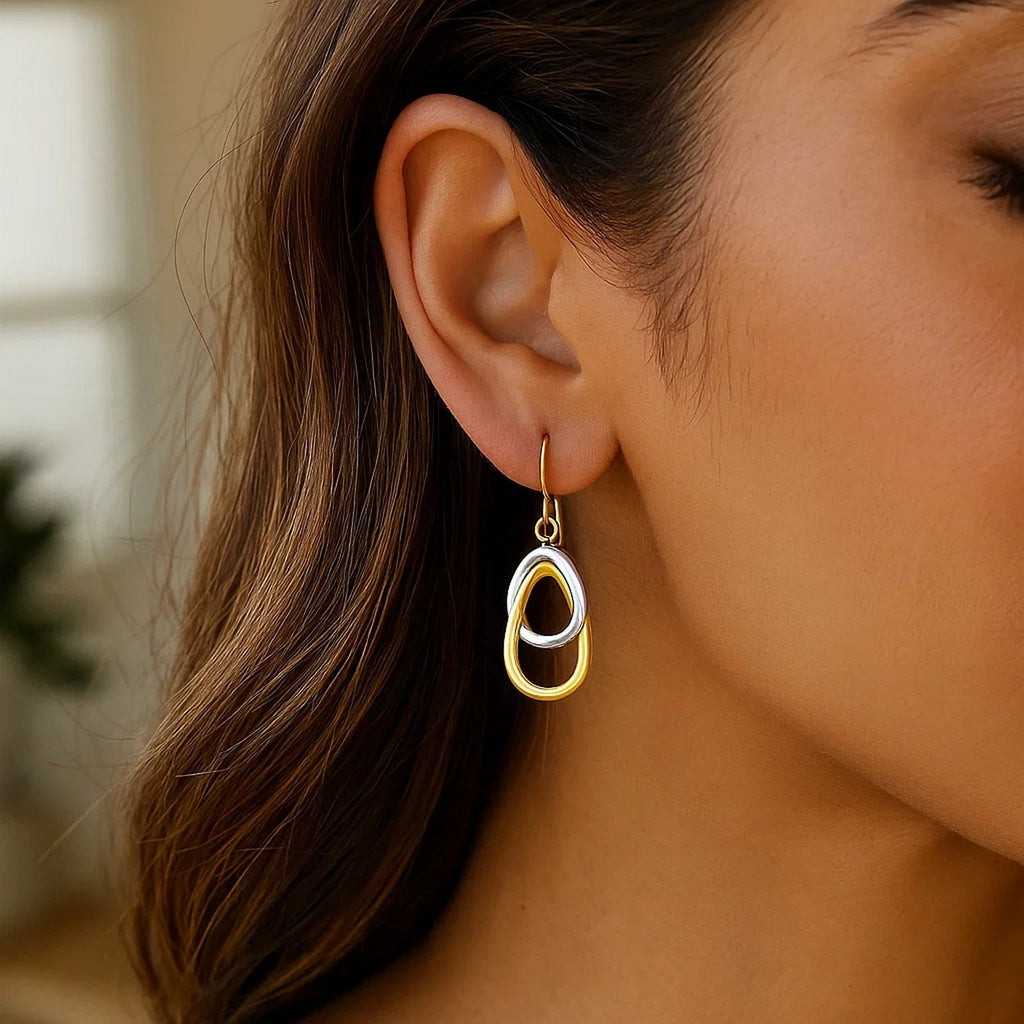 14k two-tone gold polished drop teardrop earrings with a modern design, perfect for elegant occasions.