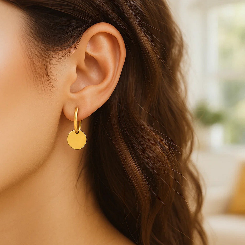 14k yellow gold polished hoop drop earrings with a sleek modern design, perfect for elegant occasions.