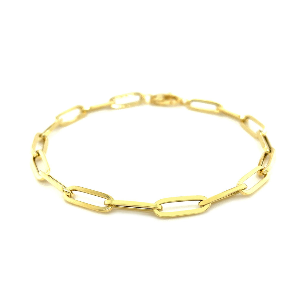 14k yellow gold bold paperclip chain bracelet, modern design with sleek round links, perfect for elegant layering.