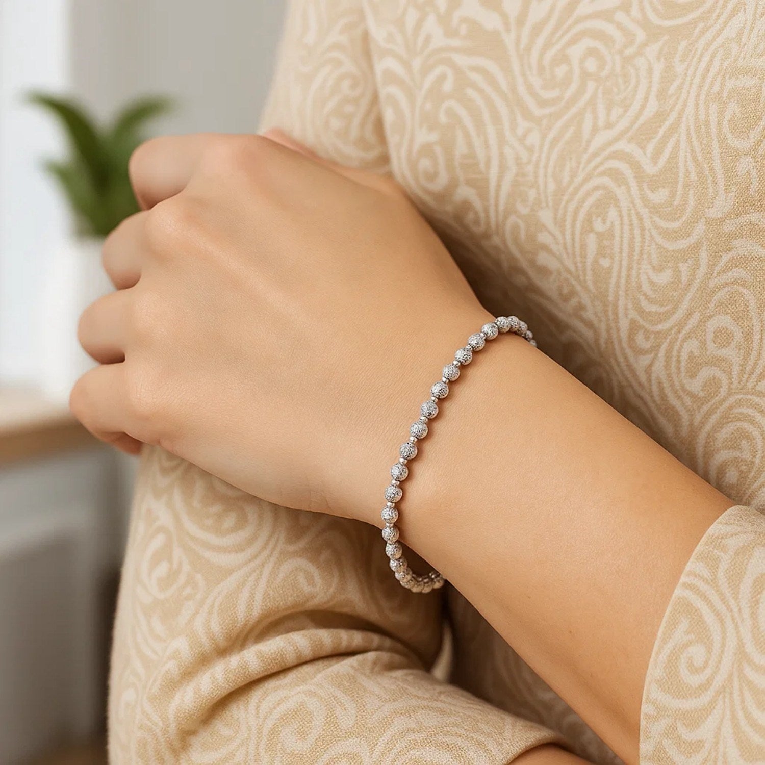 14k white gold disco diamond cut bead bracelet showcasing modern luxury with exquisite diamond accents.