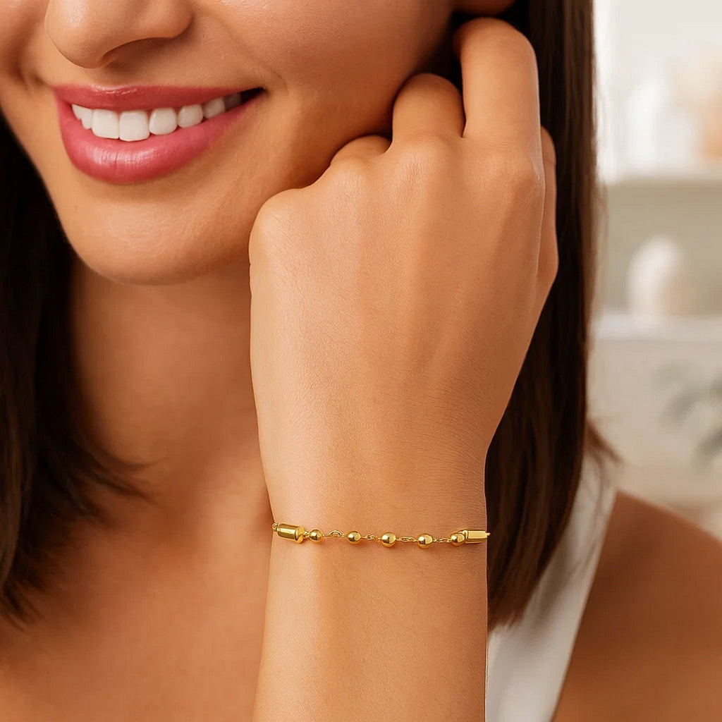 14K yellow gold adjustable bead link bracelet with a modern design, perfect for layering or standalone elegance.