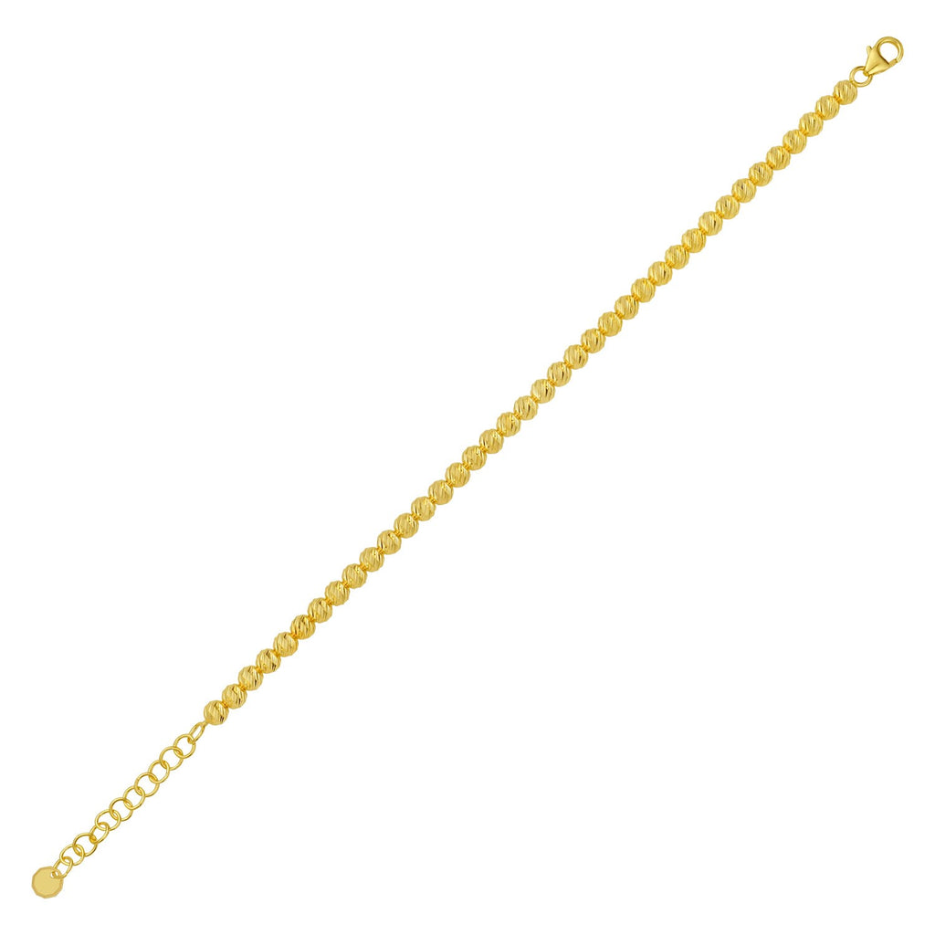 14k yellow gold bead bracelet featuring a modern design, perfect for adding luxury to any ensemble.