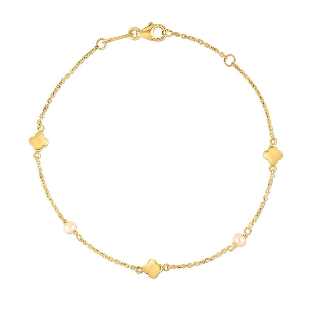 14k yellow gold minimalist bracelet featuring a lustrous pearl clover design and elegant link detailing.