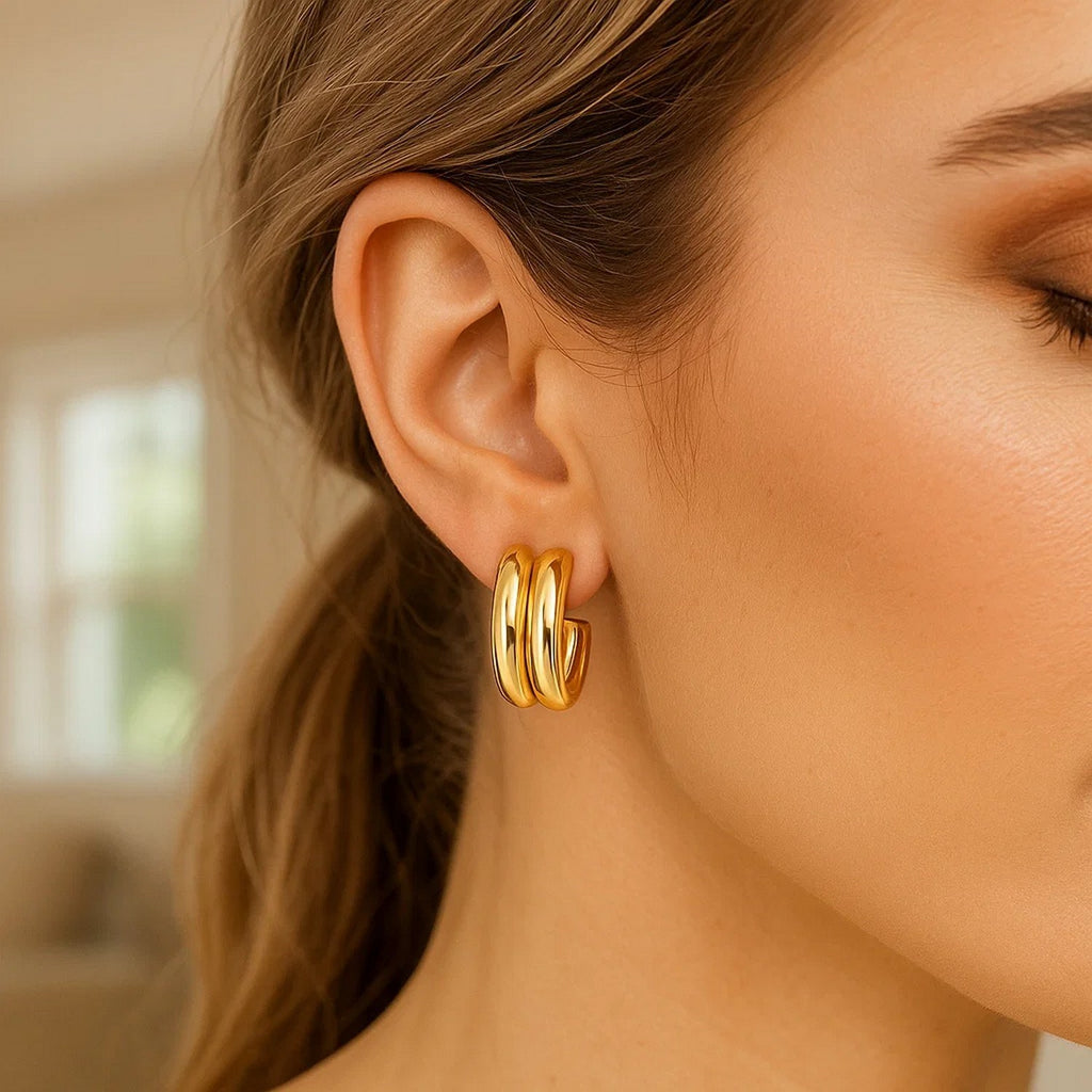 14K yellow gold polished double row C hoop earrings, showcasing modern elegance and refined craftsmanship.