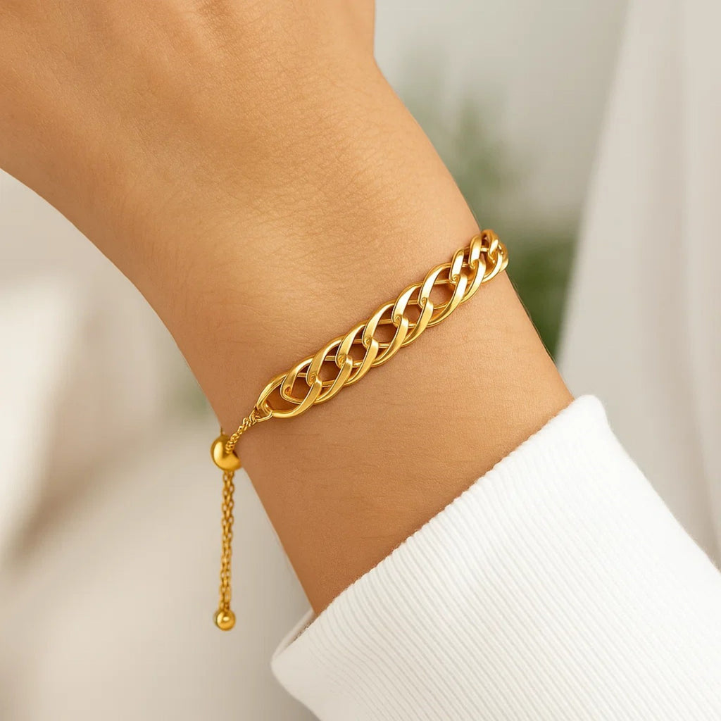 Adjustable 14k yellow gold chain bracelet featuring a modern design and 5.00 mm round links for elegant versatility.