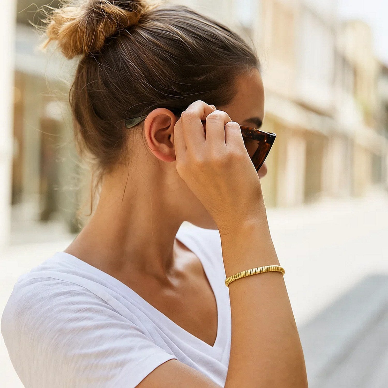 Contemporary 14k yellow gold Tubogas bracelet featuring elegant round links, showcasing luxury craftsmanship.
