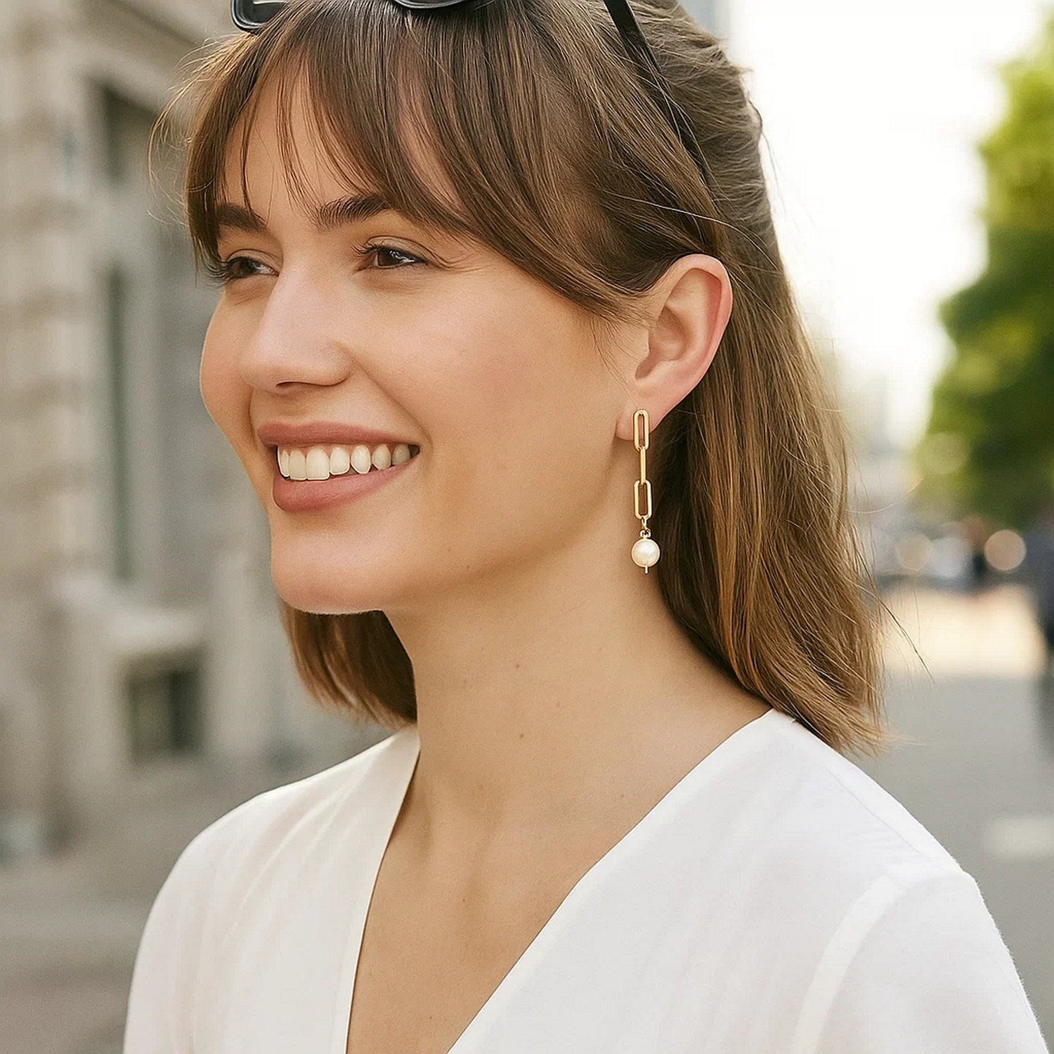 14k yellow gold drop earrings featuring elegant pearl chain link design for a classic, timeless look.