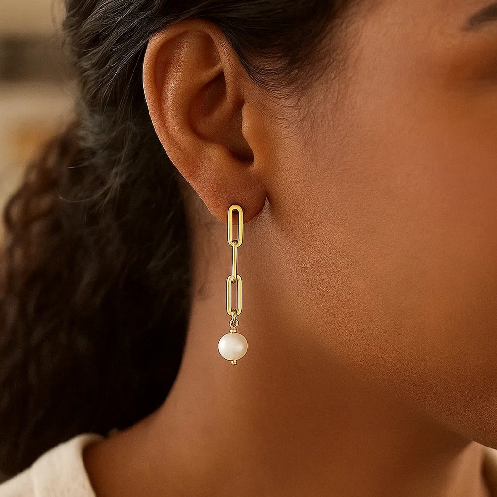 14k yellow gold drop earrings featuring elegant pearl chain links in a classic design, perfect for sophisticated occasions.