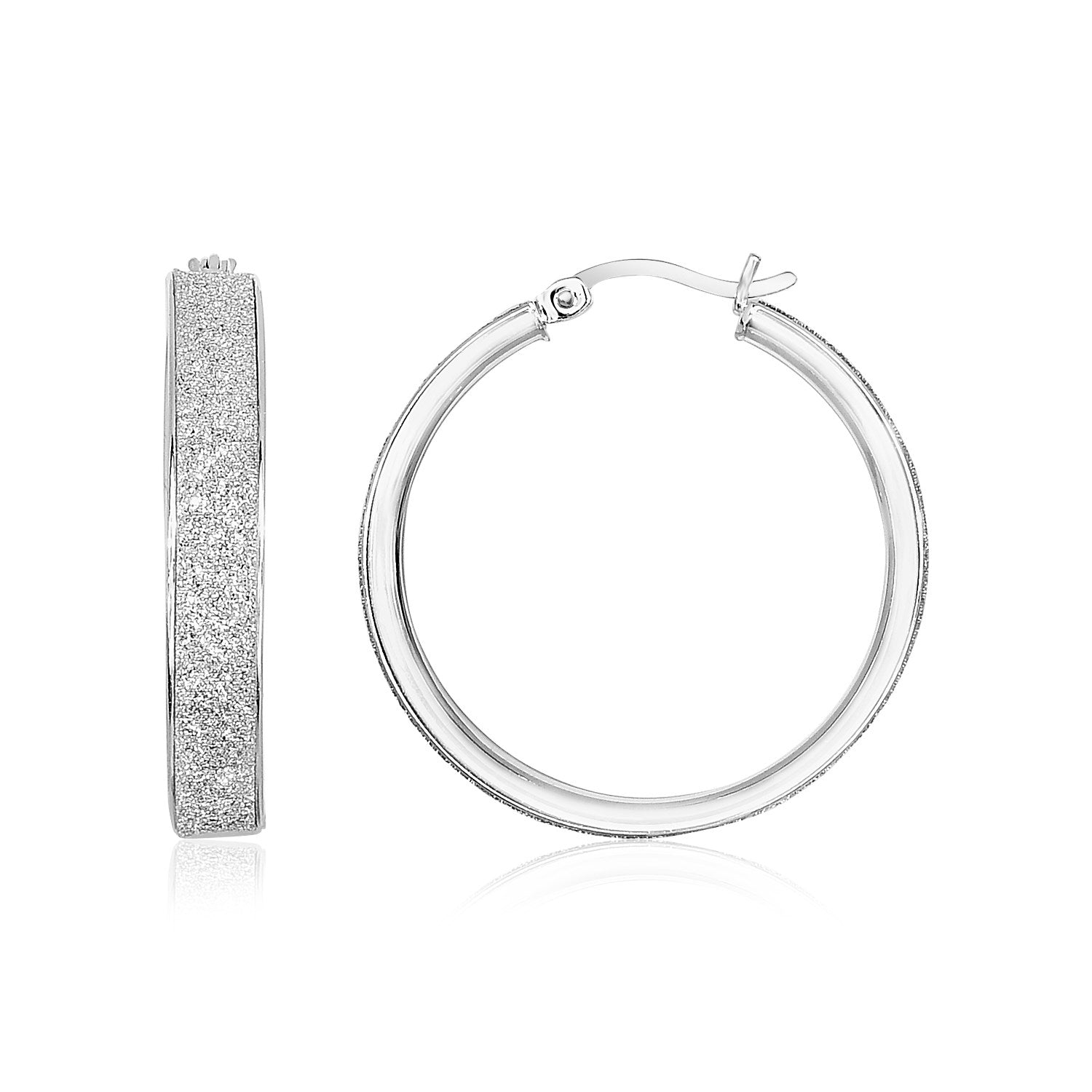 Sterling silver textured hoop earrings with a modern design, perfect for elevating any luxury jewelry collection.