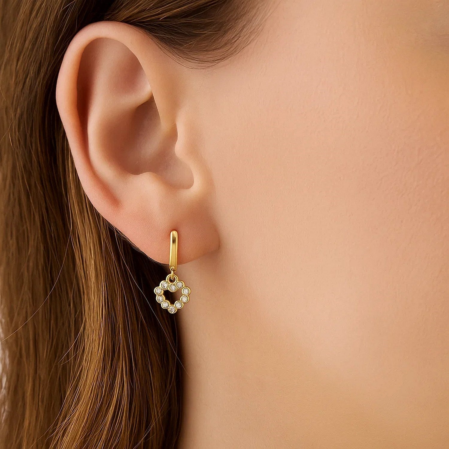 14k yellow gold petite diamond heart stud earrings with modern design and sparkling accents for elegant sophistication