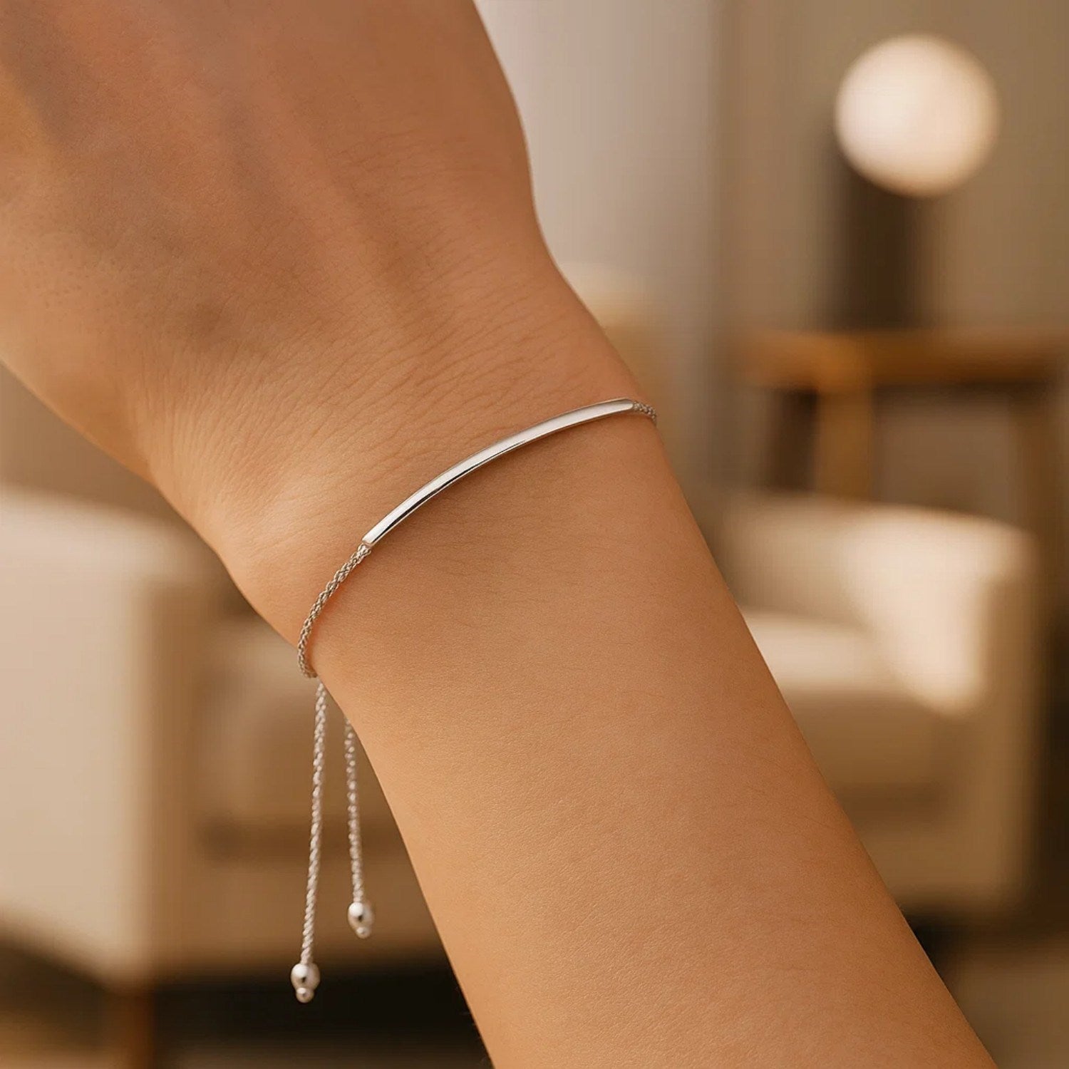 14k white gold minimalist lariat bracelet featuring a smooth curved bar design, perfect for elegant layering.