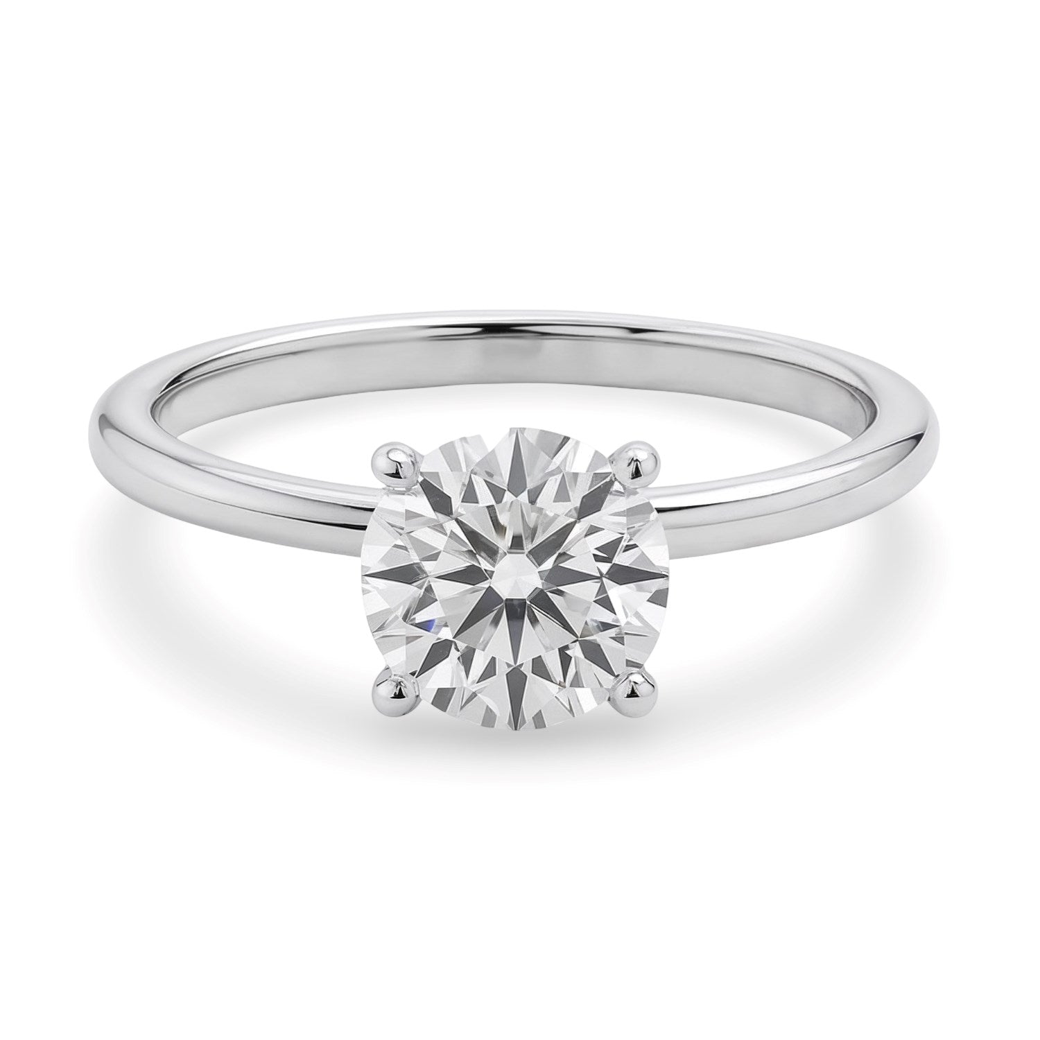 14k white gold solitaire ring featuring a 1 1/2 carat round lab-grown diamond in a classic prong setting