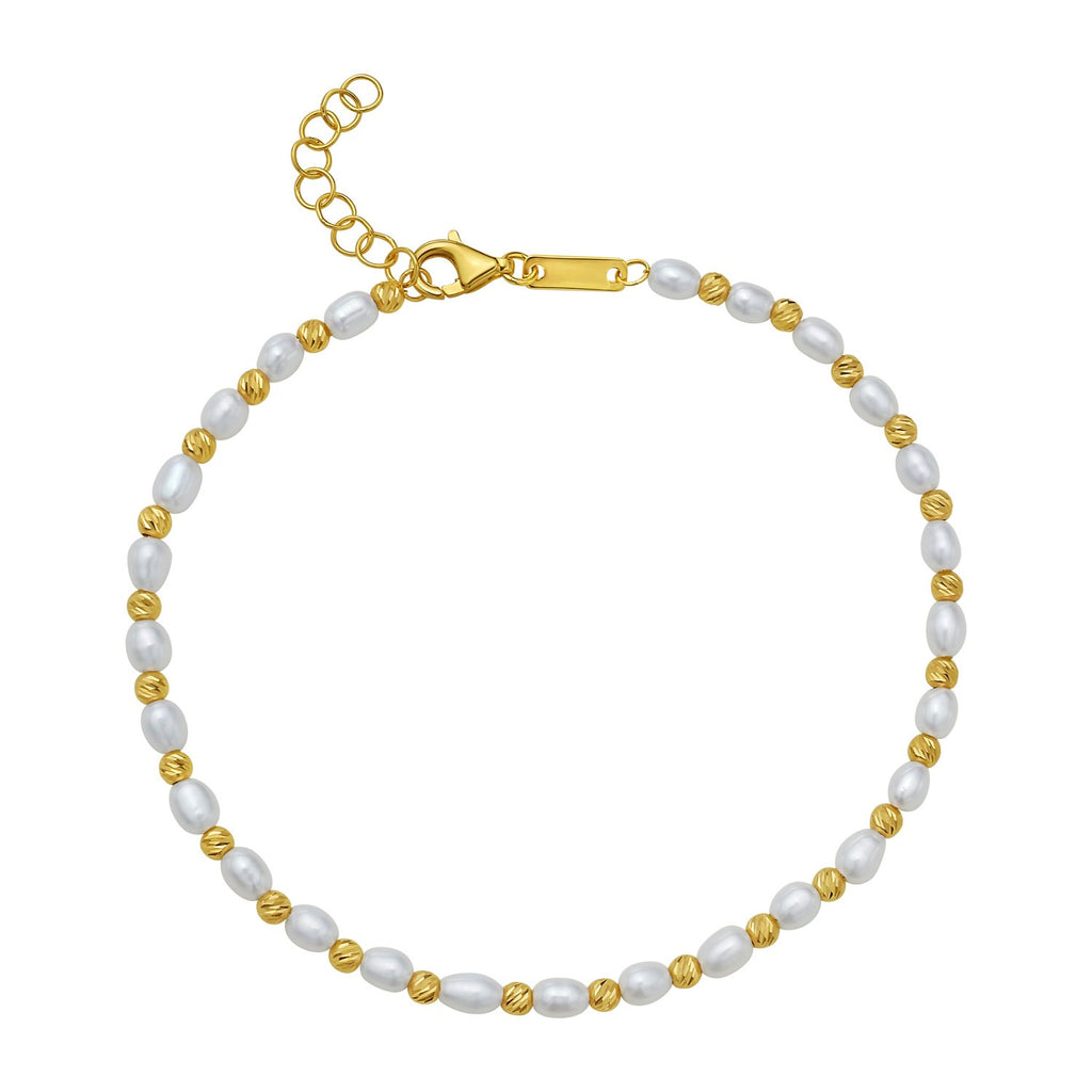 14K yellow gold faceted bead bracelet adorned with elegant freshwater pearls for a luxurious touch.
