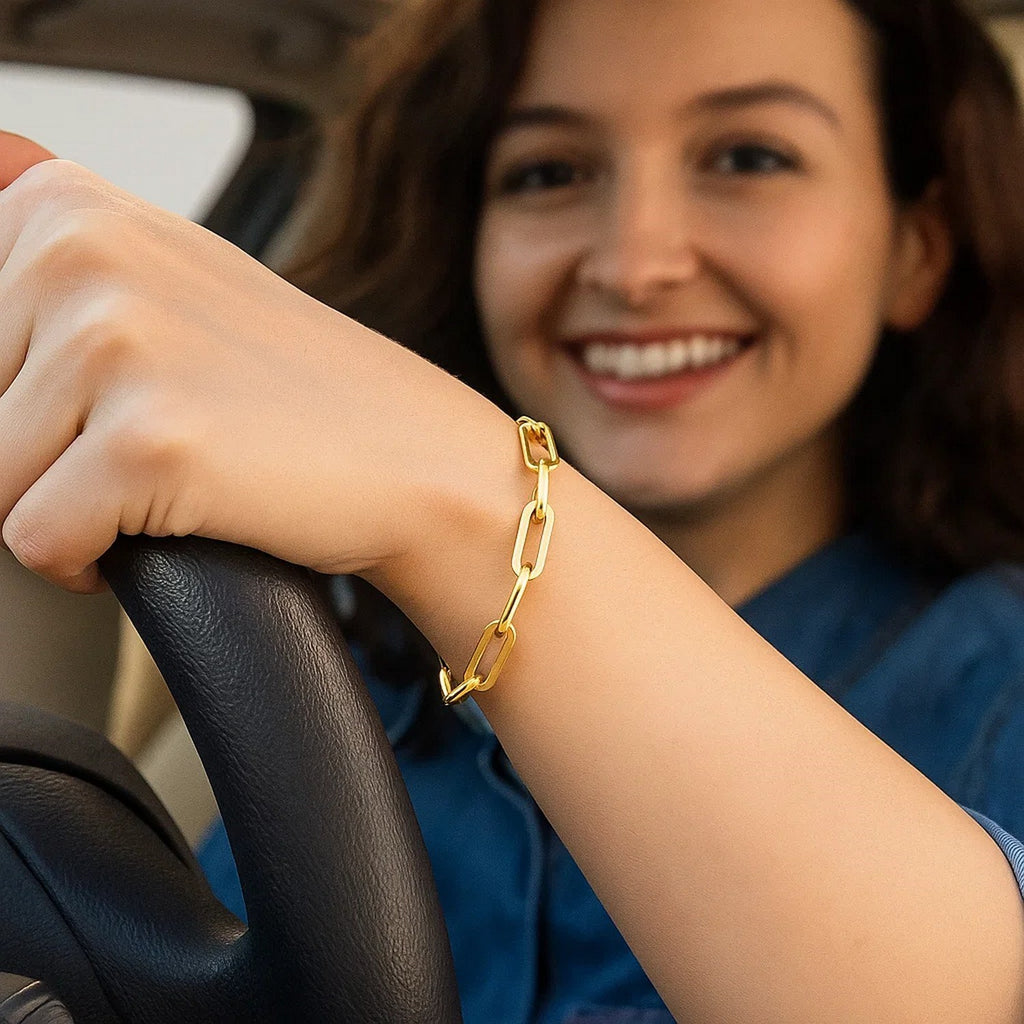 14K yellow gold extra wide paperclip chain bracelet with contemporary link design, perfect for elegant layering.