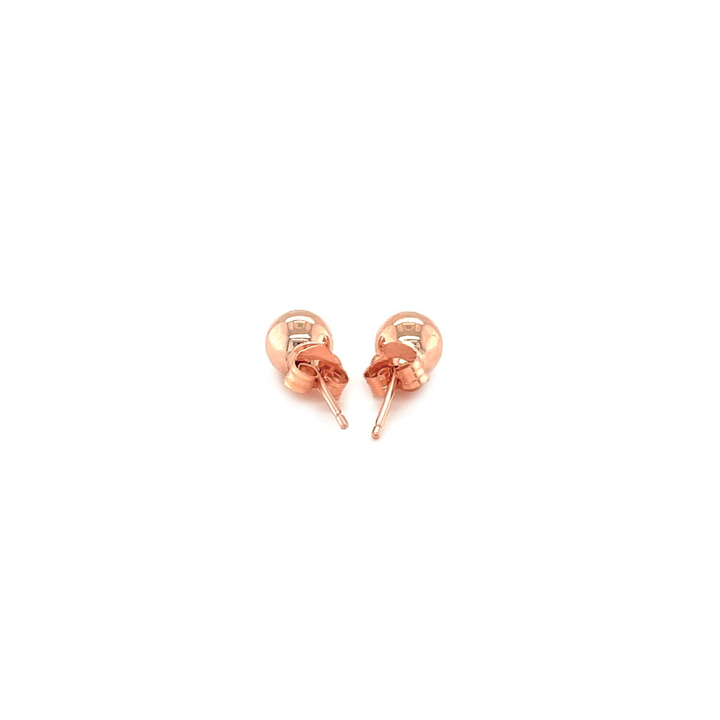 14k rose gold round stud earrings (5mm) with a modern design, perfect for elegant everyday wear.