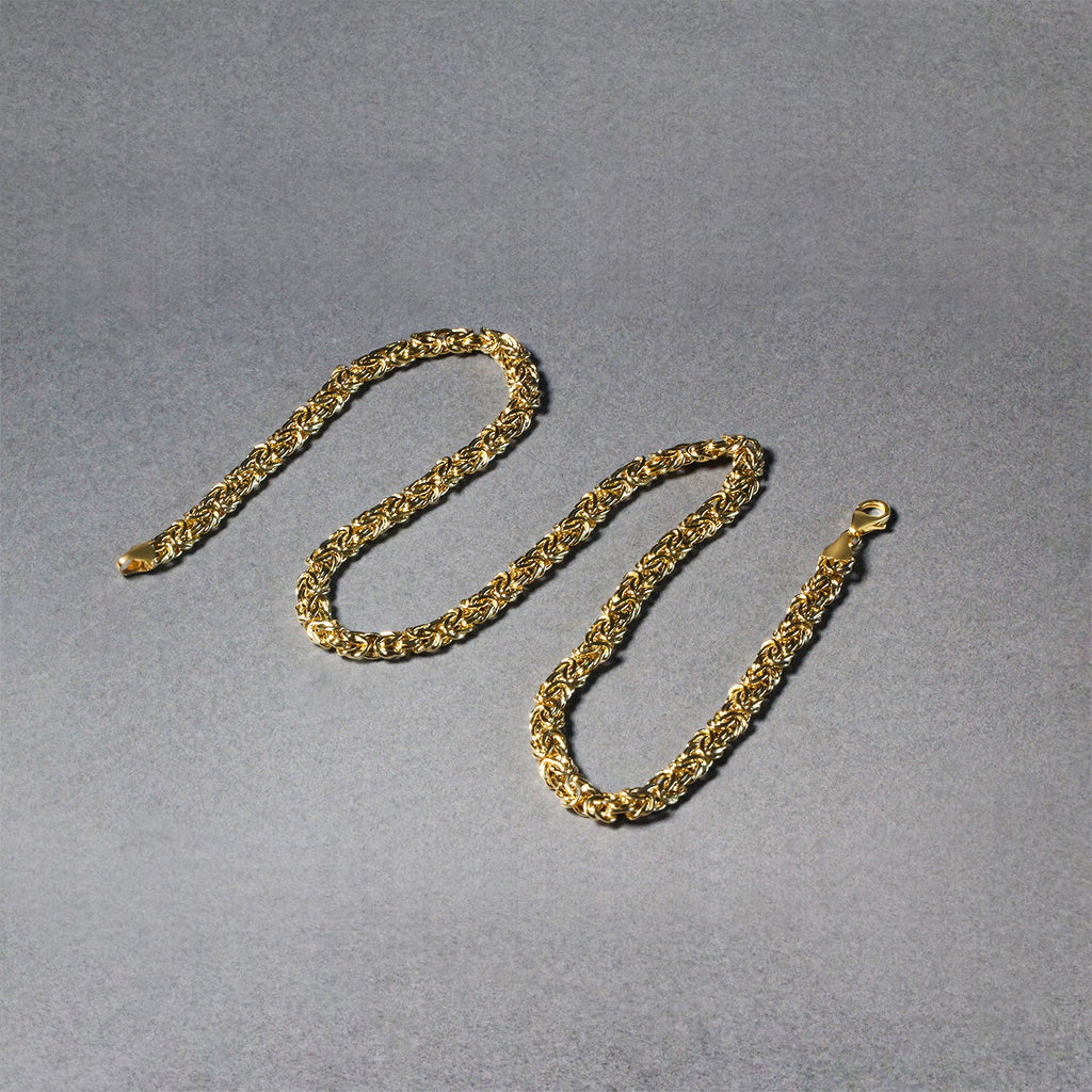 14k yellow gold fancy Byzantine chain necklace with modern design and elegant stud detailing.