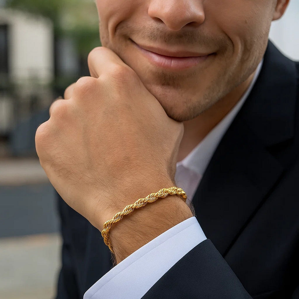 14k yellow gold silk rope chain bracelet with modern design, showcasing elegant craftsmanship and luxurious appeal.