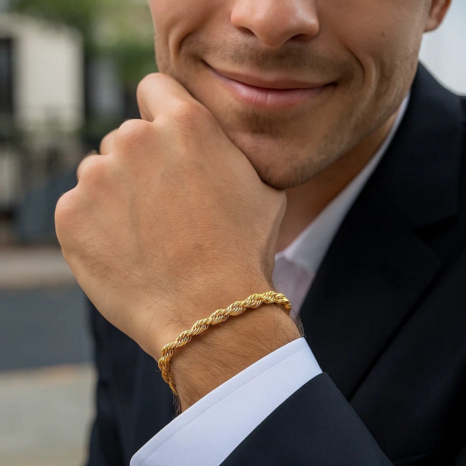 14k yellow gold silk rope chain bracelet with modern design, showcasing elegant craftsmanship and luxurious appeal.