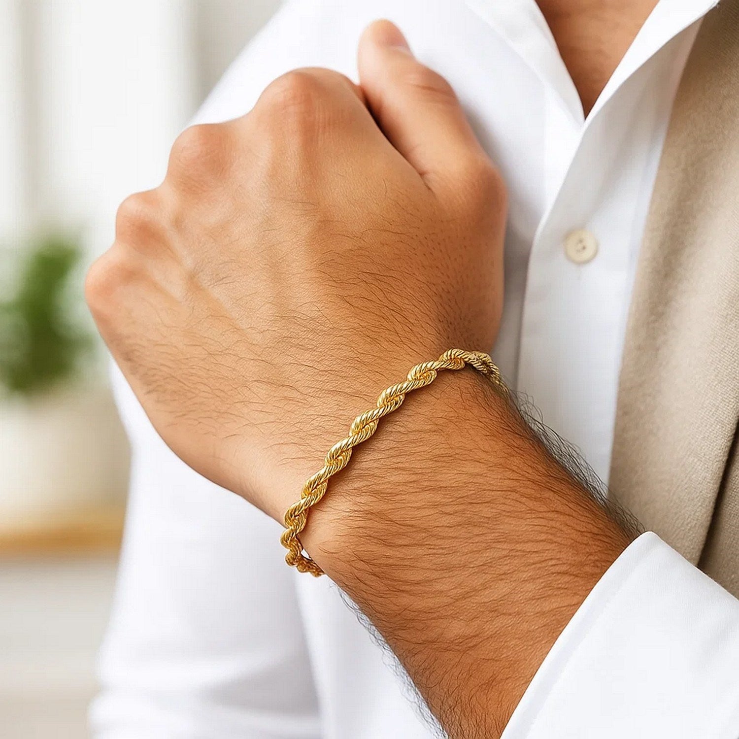 14k yellow gold silk rope chain bracelet, modern design with elegant texture and refined craftsmanship.